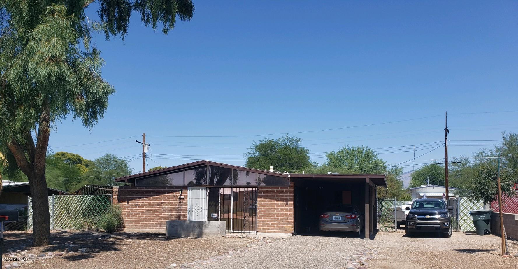 Pride of Ownership! Ranch style home on the East side of Tucson. Newer AC and tankless water heater. Lots of Natural light. Kitchen has plenty of cabinets and counter space with eat in dining area. Full length patio outside with mountain views. 1 car carport with plenty of additional parking and a storage room! Large back & side yards. No HOA