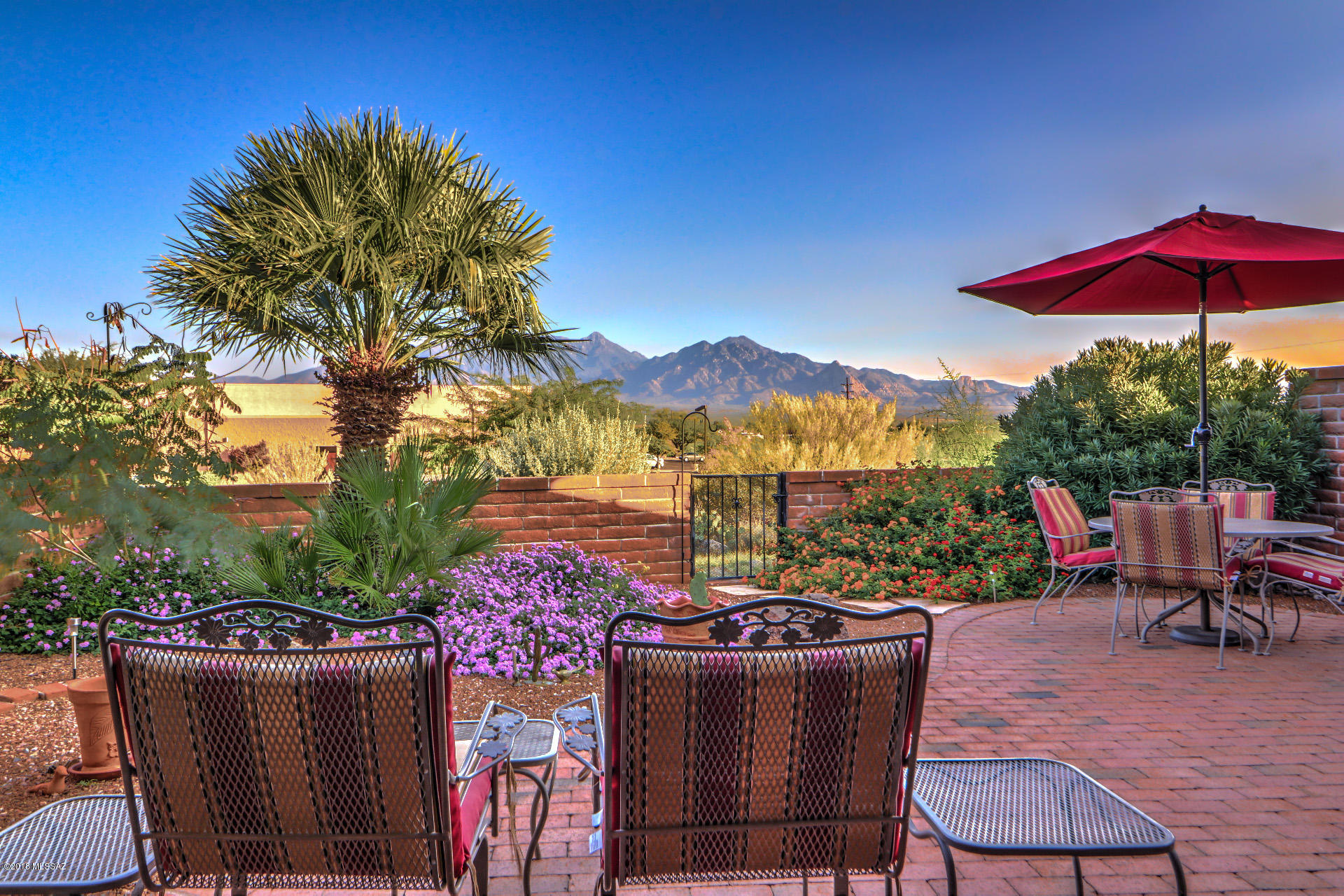 Location Location! Views, views, views!  Popular attractive slump block brick exterior townhome situated on a quiet Cul de sac . The Canoa Hills GVR center less than a quarter mile away is almost  your neighbor, for convenient social activities, swimming, shuffleboard, or using one of the nicer exercise/work out rooms in the area. Relax on the  East facing back patio and  soak in the panoramic Santa Rita Mountain views.
Inside you will find a freshly painted interior and well thought out floor plan. Step into the attractive foyer,notice the Mt views from the living rm, appreciate the separation between the owners suite and the guest room.l This plan also features the oversized 2 car garage offering you plenty storage space!  Location location again...several golf courses  are very near by