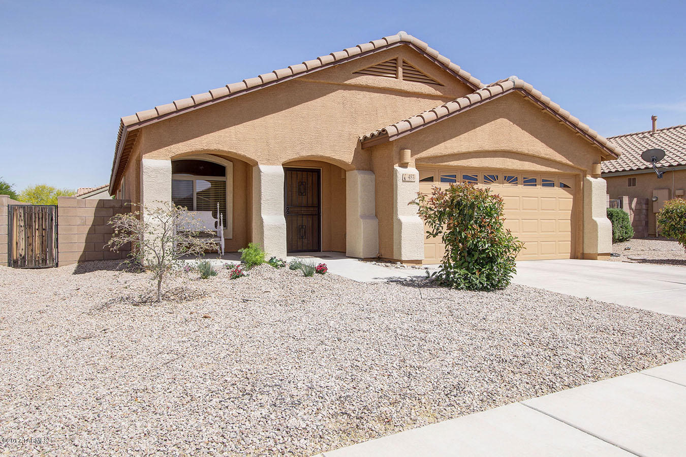Perfect 4 bedroom 2 bath home in Corona De Tucson! Separate formal dining room & living room perfect for entertaining. Kitchen is gorgeous w/upgraded cabinets, stainless steel appliances, huge pantry, & Corian counters that opens into family room. Porcelain Tile thru-out. Large Master bedroom and master bath has dual sinks! Guest bedrooms nice sized.  Fully landscaped backyard with covered patio, gates on both sides, and herb garden! New exterior paint.  Must see this beautiful home!