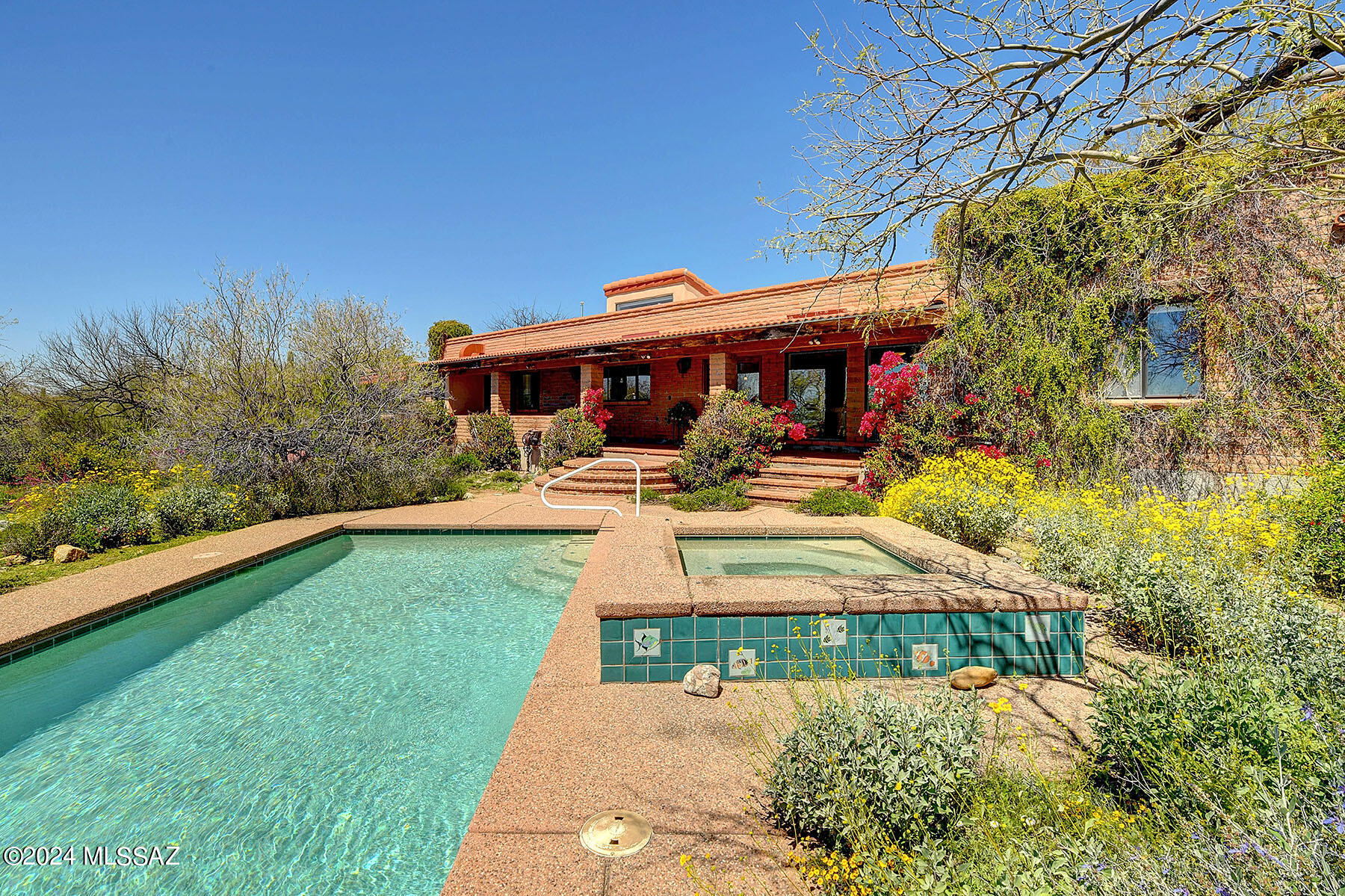 Remarkable Opportunity to own a Special property in the Community of La Cebadilla Estates. Sitting on 5.4 acres of Horse property in Tanque Verde Valley, the Views will Amaze you! Sit on the back porch or in the sparkling pool or spa while surrounded by the beauty of the Mountains. Close to Redington Pass, Saguaro Nat. Park East & hiking trails, you won't lack for outdoor adventures! Down the street is a private lake just for the community. The 3bed/3 bath home has split floorplan, large primary suite w/office & fireplace. 2 Guest bedrooms & bath, on opposite end of home. Family room has stunning views, fireplace, beamed ceiling. Separate living room w/lovely wood built-ins & Separate dining room. Kitchen is light filled w/high ceilings, granite countertops, large island & breakfast bar.