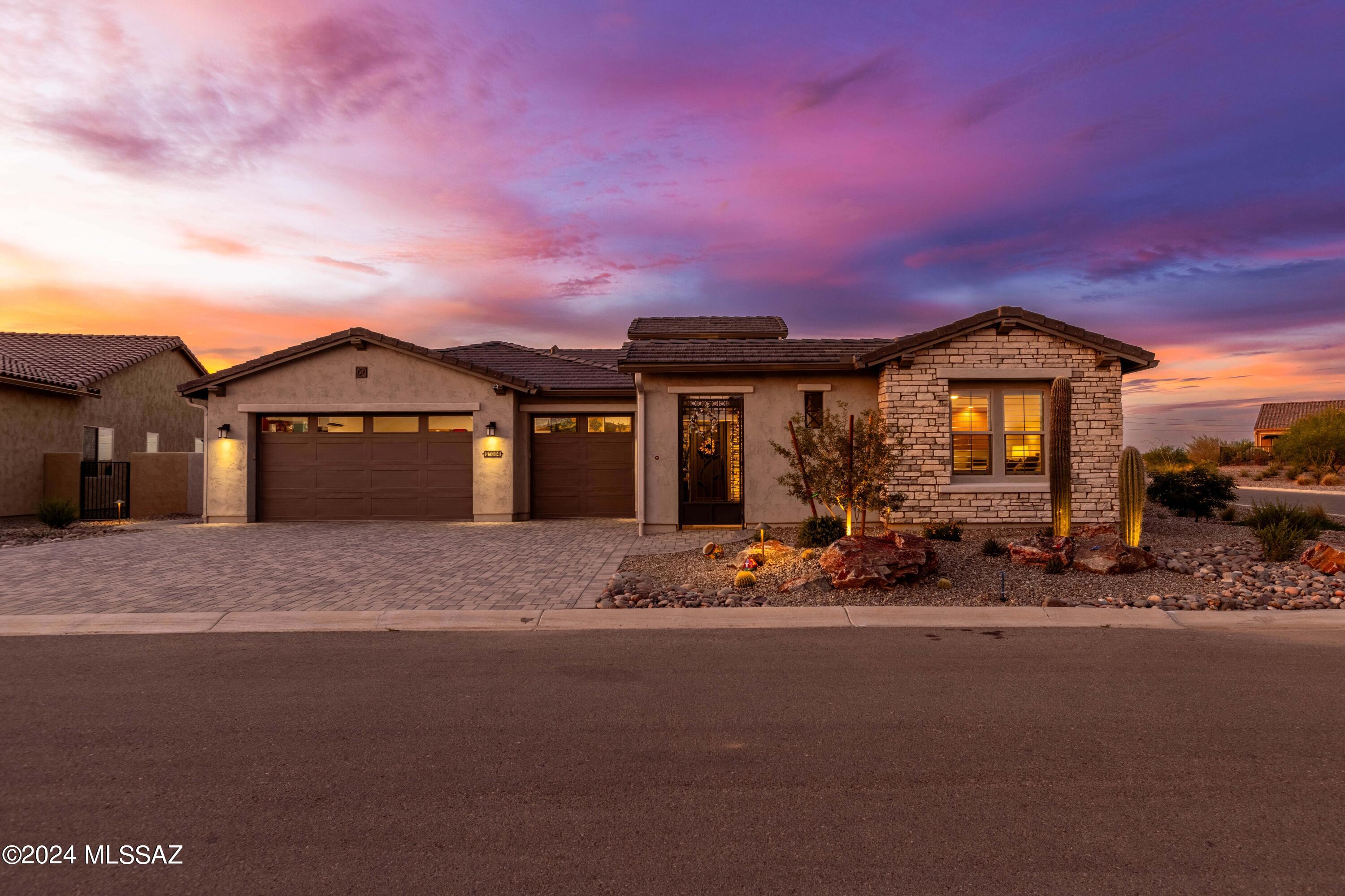 If you're looking for a luxury home in the highly sought-after community of SaddleBrooke Ranch, this is the one. This home has it all, and is in like new condition, with a fabulous pool and spa. This home is a sanctuary for anyone seeking both comfort and relaxation. Enter through the elegant foyer to the Great Room perfect for entertaining. The gourmet chef's kitchen featuring Stainless-Steel appliances, gas cooktop, designer backsplash, and shaker style cabinets. The Butler's pantry provides ample storage, and the Quartz-topped Island is the centerpiece of this magnificent space. The primary suite has many extras that promote its spa-like appeal. In addition to the soothing soaking tub, the suite also contains dual vanities, a walk-in closet with built-in cabinetry, and a spacious shower. The split bedroom floor plan offers you and your guest's additional privacy, and the den can serve as an office or additional TV room. The Casita is an amazing space for guests, an office, craft, or game room. The home also offers upgraded neutral tone wood looking tile flooring, carpeted bedrooms, and plantation shutters. Walk out to your amazing extended paver patio with Rolling Shades and enjoy the outdoor living that is the signature of Southern Arizona. The sparkling Pool and Spa await you and your guests. The garage is oversized and has opulent epoxy floors, mini-split A/C, tankless water heater and whole home water filtration system. This home is in like-new condition and has many more features than mentioned, it is not to be missed!  Why wait to build when you can start enjoying all that SaddleBrooke Ranch has to offer today.