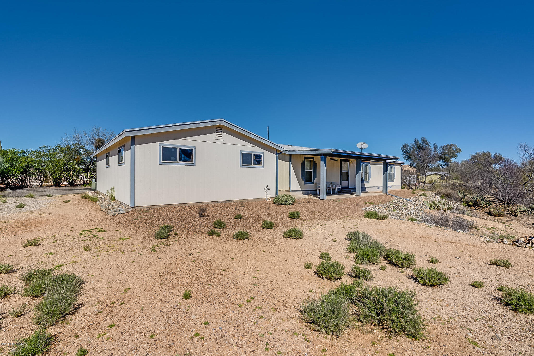 If you love beautiful views - come take a look at this home! Lovingly maintained home in Catalina situated on a hill. You can sit out on your back porch and enjoy the spectacular view of the mountains above and the valley below. You will also get to enjoy the beautiful desert vegetation and wildlife from your own backyard. Also has detached two car garage and workshop. This is a fantastic home that won't last long. Come and take a look!