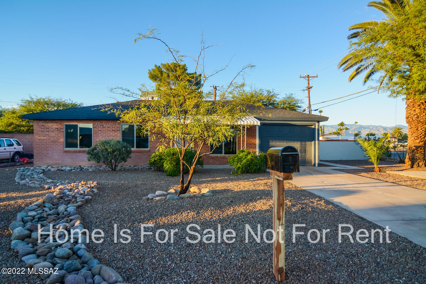 Beautifully remodeled Ranch style home. Located in a convenient Central Tucson location. Charming brick construction. Rich wood look LVP flooring. Updated kitchen with stainless steel appliances. New custom interior and exterior paint. Fenced back yard. Bonus Den. Upgraded door hardware and light fixtures. One car garage. Mature vegetation. Dual pane windows. This home shows beautifully.