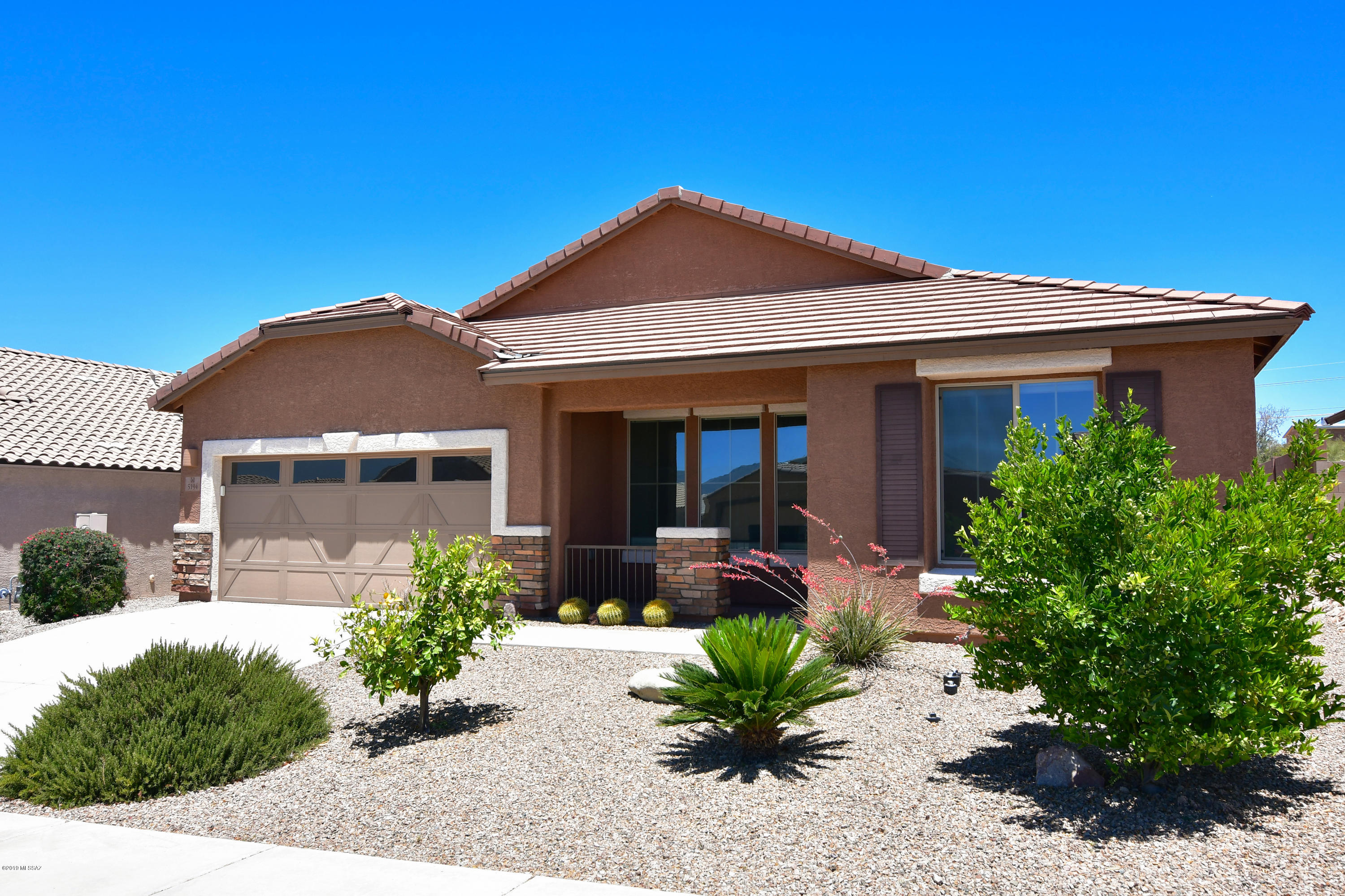 Wonderful Northwest Tucson Home Built in 2012 with a Quiet Cul-de-Sac Setting. Bright Kitchen with Slab Granite Counters, Stainless Appliance & Center Island with Breakfast Bar. Dining Area Accommodates a Large Table. Open Family Room with Gorgeous Large Tile Flooring. Living & Dining Rooms for Entertaining. Huge Master Suite with Oversized Master Closet. Generous Master Bath with Soaking Tub, Separate Shower & Double Sink Vanity. Two More Bedrooms with Ceiling Fans & a Full Hall Bath. Den & Laundry Room with Cabinets. Private Outdoor Living Space with a Shady Covered Porch, New Professional Landscaping & Fenced-in Pet Friendly Yard. Ultra Convenient NW Tucson Location Close to Arizona Pavilions & The Tucson Premium Outlets for Shopping & Dining and Easy I-10 Access. Move-in Condition.