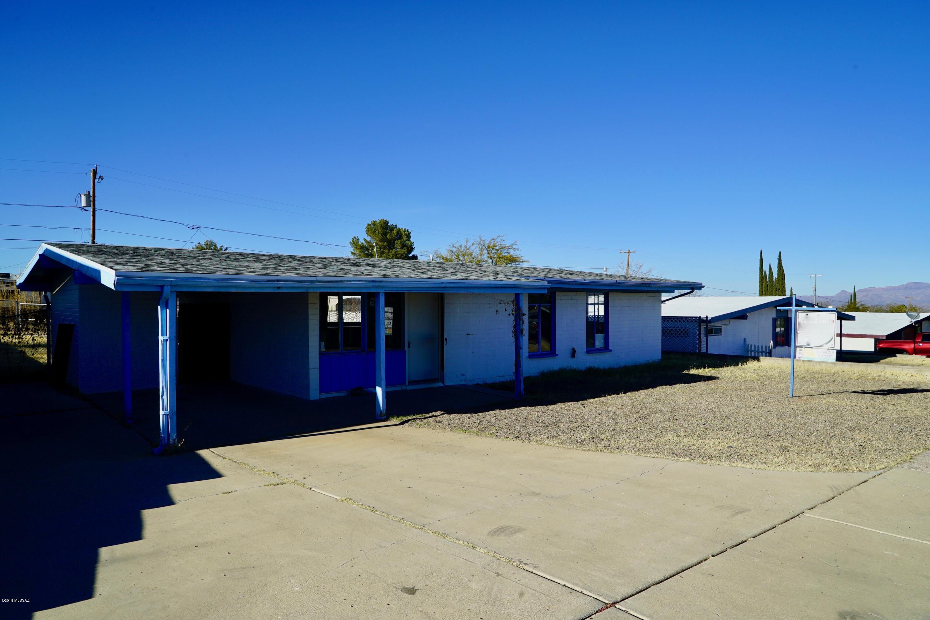 Perfect little starter home or rental with a huge lot! Drive in gate to back yard from alley access. 3 bedroom 1 bath with new carpet and paint inside! New heat pump! Large storage room in breezeway and huge covered patio. Make this San Manuel home yours today!! Home warranty is offered with 2-10 Home Warranty for acceptable offers only. Also available for rent! Owner/Agent.