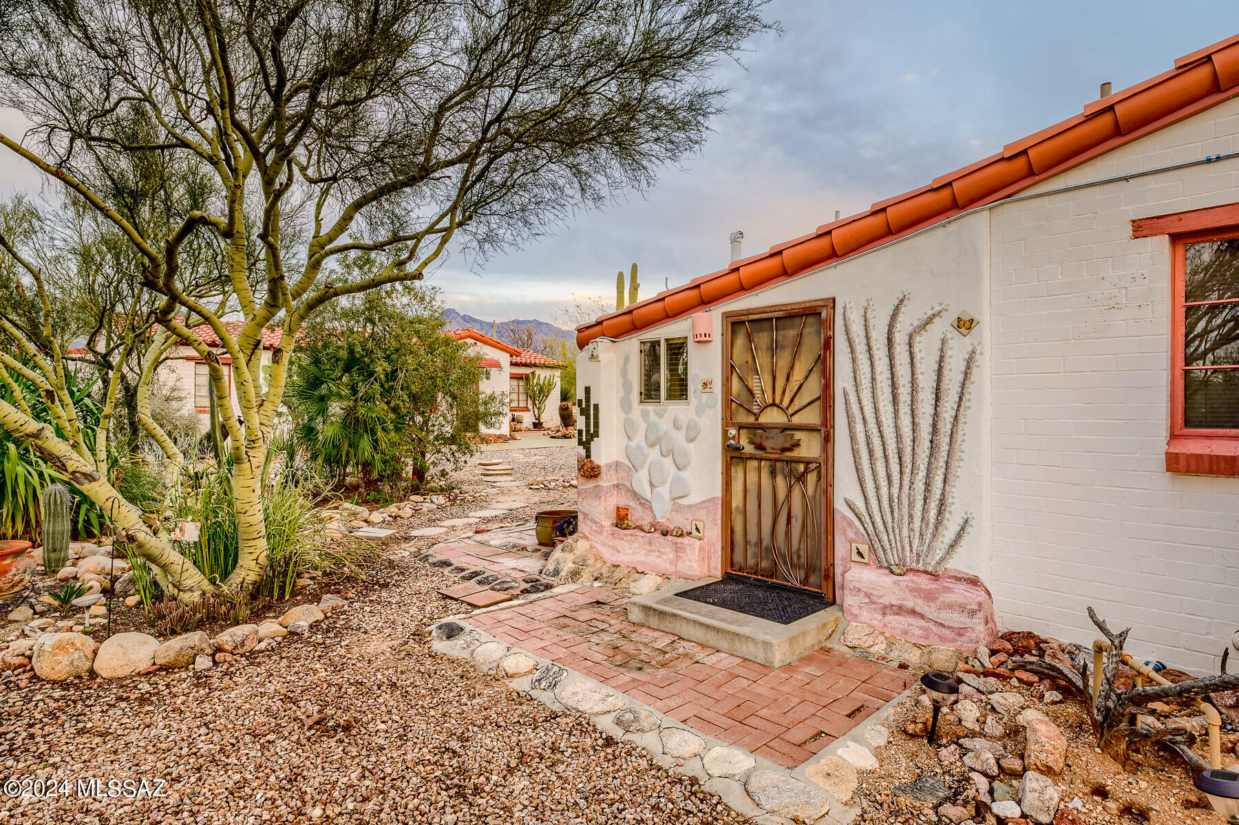 Magnificent historic properies plus a huge 1,900 sq.ft. detached garage w/ heating &cooling, bath, laundry, storage & office sitting in 2 acres.  The two homes were developed by the first motion picture  photographer in AZ, Charles Herbert. Famous ''Ted'' DeGrazia painted on the Casita walls while staying there.  Main house of 1,636 sq.ft., 2bd/2 ba facing the Catalina mountains. The GH De Grazia-Casita has 1,094 sq.ft & 1bd/1ba and a multiuse lg rm. Both have been beautiful updated with dyed concrete floors, newer tile roof, water lines, electrical and more! Saguaros and rock sculptures embellish the two acres of natural desert & it's incredible flora and fauna! Come and experience it all! Near finest amenities & restaurants. & No HOA