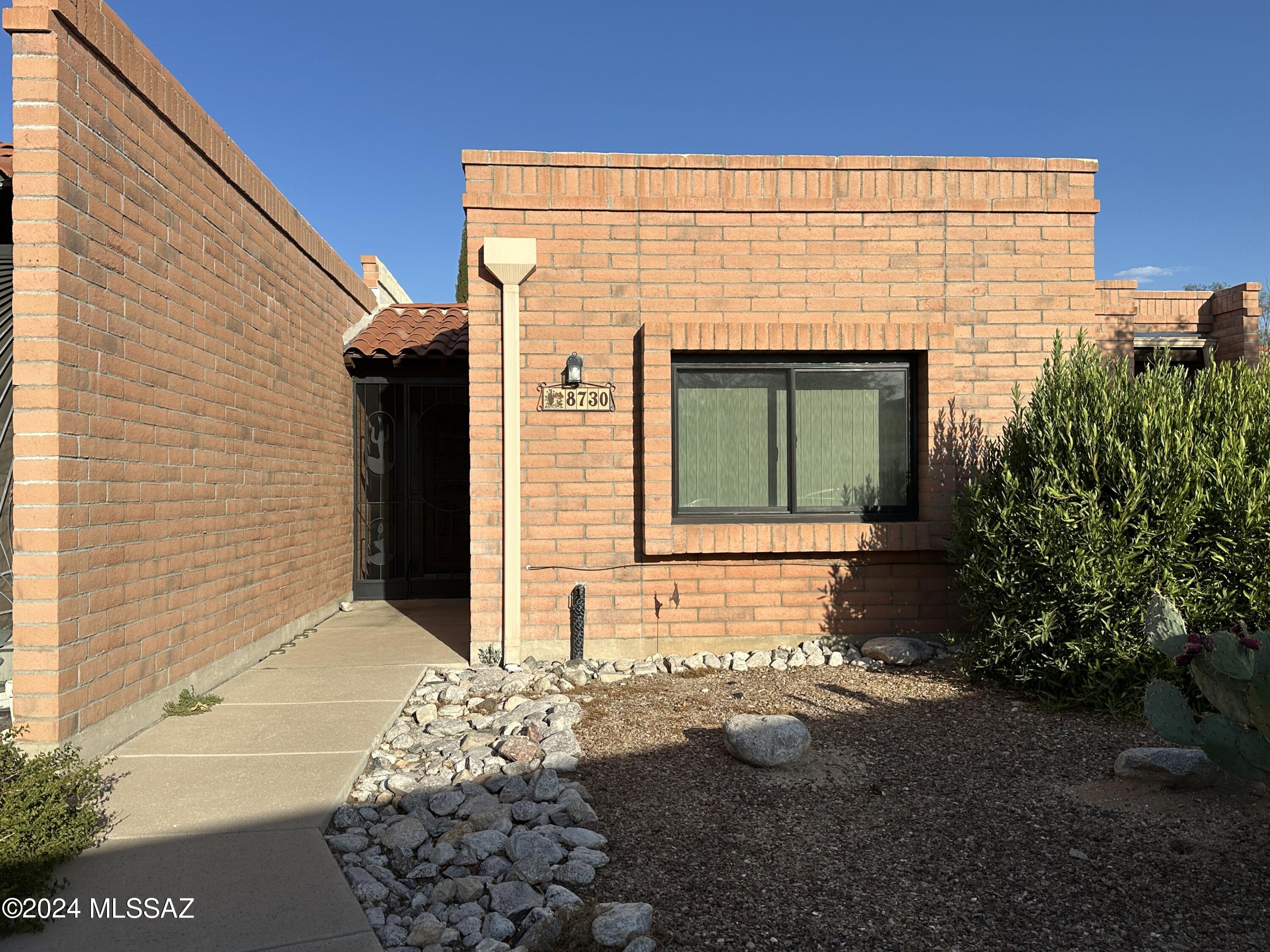 Beautifully updated townhome located in desirable La Cholla Hills 55+ Community. This 2 beds 2 bath split floor plan has been tastefully updated throughout. The great room and hallway floors are porcelain wood tile, both baths have ceramic tile floors with carpet in the bedrooms.

With a few added skylights to brighten up the home! The laundry/storage room off the back patio has plenty of shelves with a washer/dryer in unit! The back brick patio is perfect for relaxing and enjoying the cooler Tucson weather.
This community includes 2 Pools, Spa, Tennis, Pickleball, Shuffleboard, and private recreation center with kitchen.


Trash and front yard maintenance is included in the monthly rent!