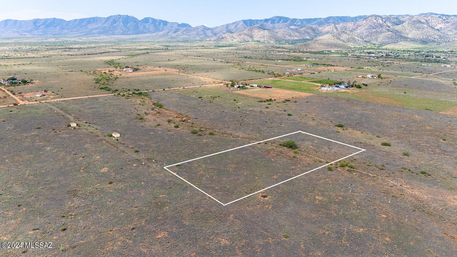 PRICE REDUCED AGAIN! Discover the perfect blend of privacy and convenience on this ready-to-build 4-acre lot in Sunsites. With stunning views of Cochise Stronghold and the Dragoon Mountains, this lot offers a tranquil, country feel while being just minutes from town. Enjoy the rare beauty of dark skies and breathtaking views of the Milky Way right from your backyard. The property features underground power and a shared well with an installed water line and meter. Coveted RU-4 zoning allows for the Cochise County Opt-out, giving you exceptional flexibility for your build. With few neighbors and the option to purchase four adjoining lots on the well-share, the seller is open to combining parcels to expand your vision. This is an ideal location for your custom retreat.