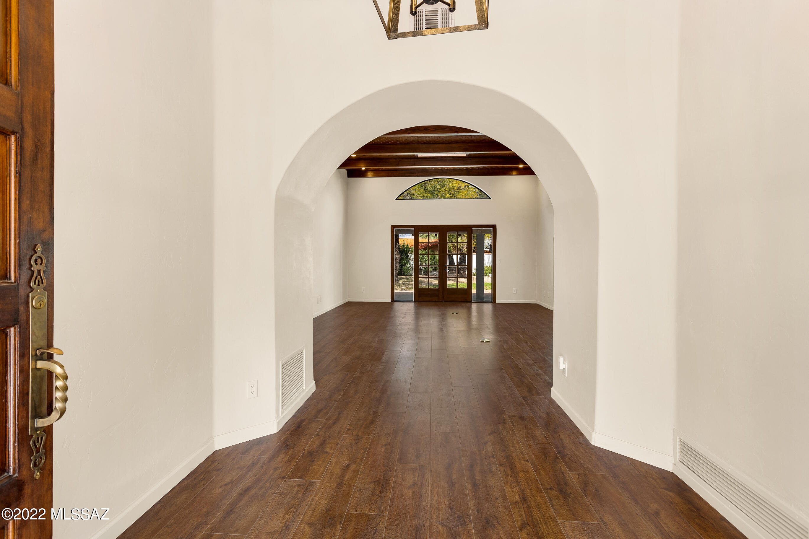 A rare opportunity to own in El Dorado Country Club Estates, .38 acres corner lot. Meticulously updated in 2020. You will love the kitchen - GE Café double oven, Moroccan tiled hood vent, GE Profile five-burner stovetop, GE Café refrigerator, wine fridge. Custom handmade cabinetry with soft close drawers, floating shelves, Quartz countertops. The living room welcomes you with vaulted 18 foot exposed beam ceilings with natural lighting and French doors leading to the outdoors. Catalina Mountain views. The main house has two stylish ensuite bed/baths. Attached casita has a kitchenette and its own bathroom. So many possibilities; private office space, multi-family living, etc. New 16 SEER two-stage HVAC installed March 2021 (includes 10 year warranty). Solar offers a monthly electric bill is $25. Solar monthly $120.04. Close to shopping, restaurants, minutes from three hospitals. Enjoy Dorado golf course and community pool.
