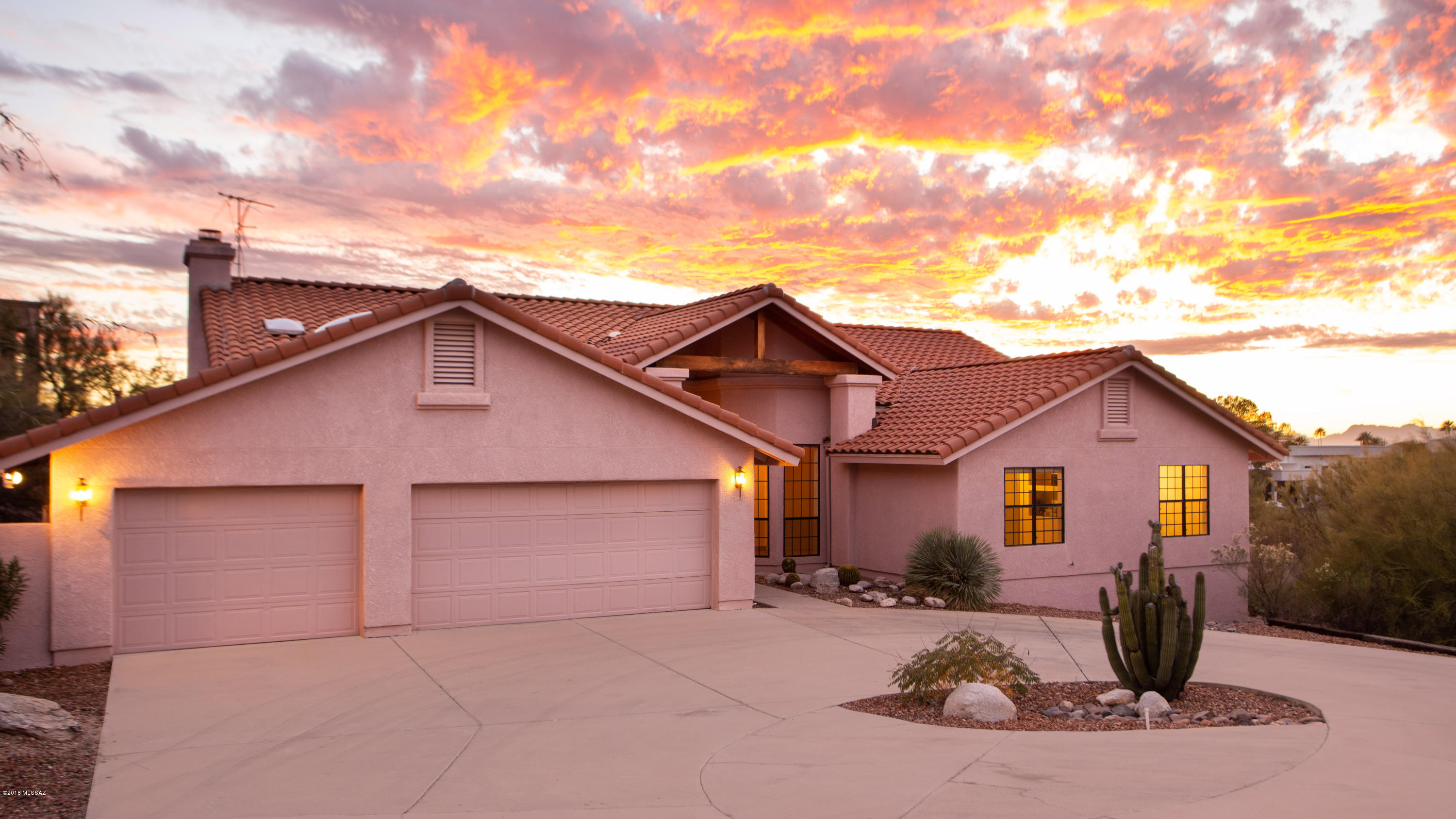 Enjoy gorgeous views of the mountains, canyons, and city lights from this secluded 1.35 acre property. Located off a country road near Sabino Canyon and River Road. Separate living room and family room, formal dining area, and large eat in kitchen. Soaring ceilings and lots of windows to allow a bright and Airy home. Four large bedrooms featuring spacious closets. Backyard features a pool, covered patio, large grass area and more. This home has recently been re-plumed to remove the poly pipes, Newly painted on the insde and most of the outside. Ready for you to move right in and call this house your home!