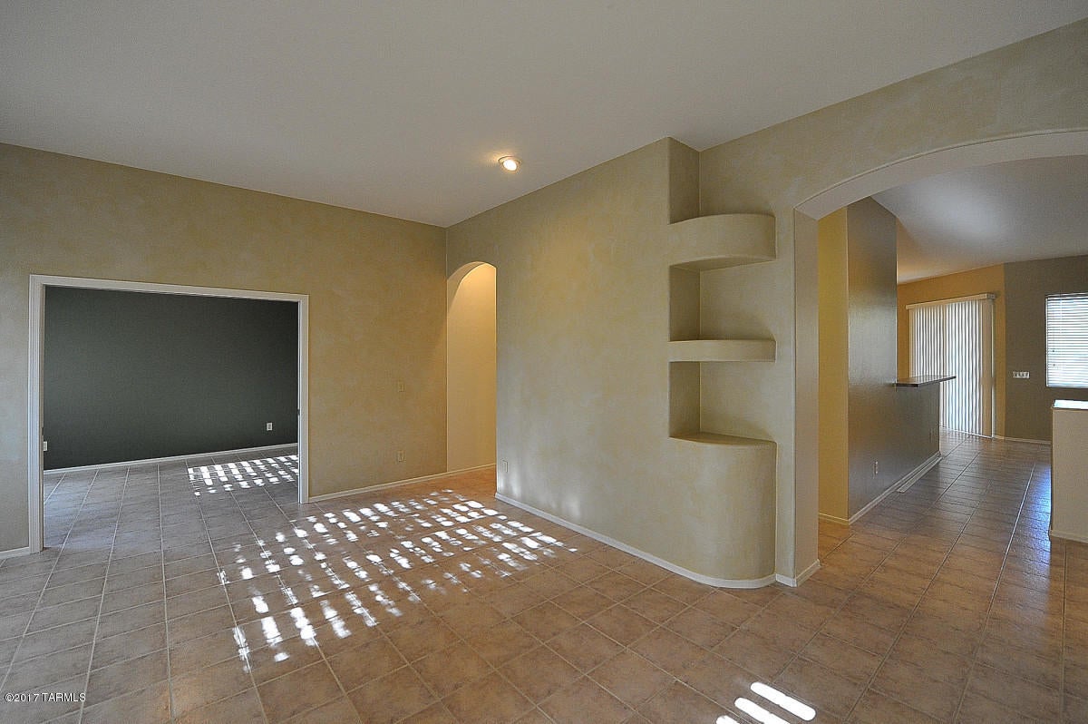 Amazing opportunity to live in gated community in Sweet Water Reserve.  You will love this 3 bedroom, plus den, 2 bath home, sits in a cul de sac on a extra large lot,  well manicured landscaping, Inside is fresh paint, new carpet, kitchen/family room tiled floors, loads of cabinet-counter space in kitchen with microwave, refrigerator, gas cooking top, laundry room comes with a washer and dryer, split bedrooms and master suite has double vanities along with slider door to access large rear yard.  Long covered rear patio with double gates, storage room. Gated, community play ground, pool and spa.  This is a fantastic place to call HOME. Tenants pay all utilities.  Fountain in rear is not working. Ask about P#2044.