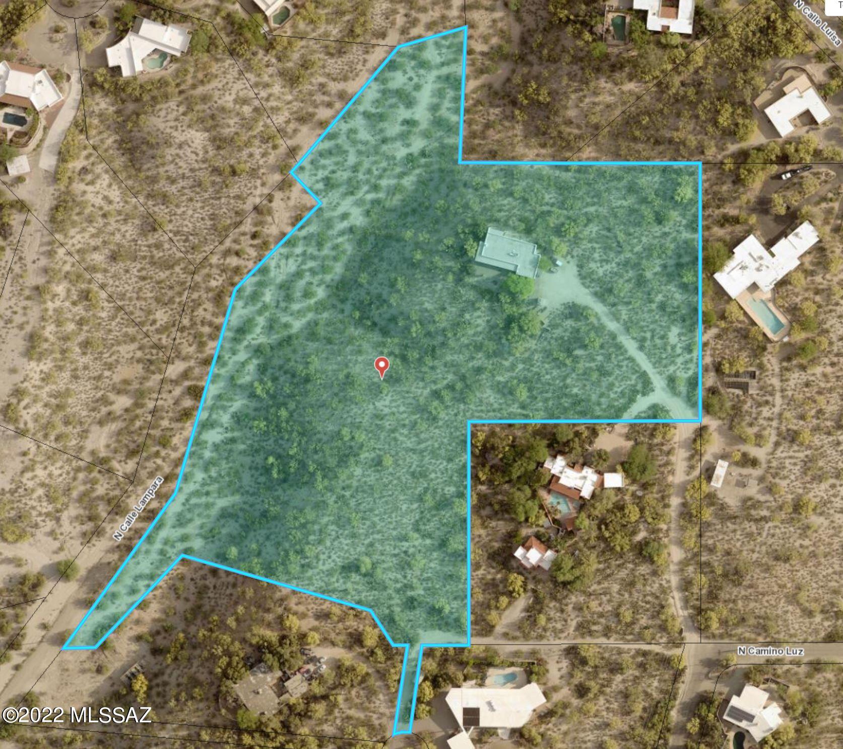 Rare 8 acres just north of River Rd and West of Campbell Ave with an older home and two additional buildable lots.  Approx 3 acres of  buffer land which is the west drainage side drainage.  Great views of mountains and western city lights.

This is a builder opportunity or potentially a new construction estate home with an existing large guest home in need of renovation.