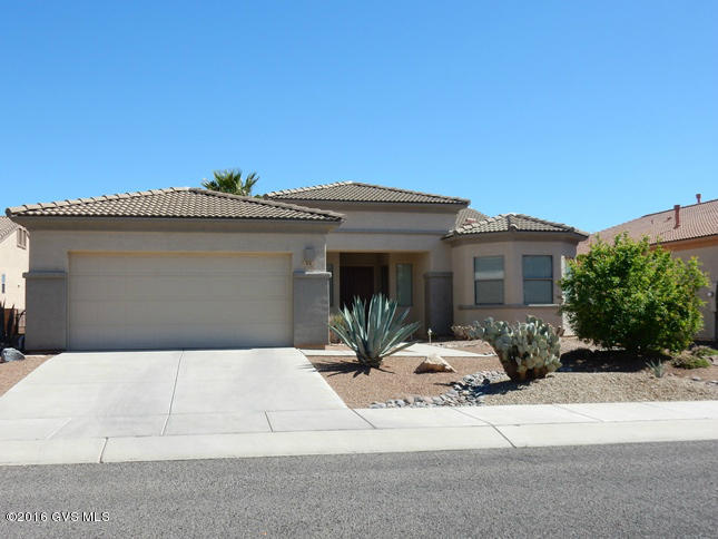 Fantastic furnished and nicely upgraded home in cul-de-sac with mountain views. Beautiful expanded San Diego model built by Monterey Homes in 2003. Nicely fully furnished per inventory, available separate bill of sale for $1.00. Ceramic tile flooring throughout the home. All appliances & window coverings stay. Great room features ventless gas fireplace with tiled surround & ceiling fan. Kitchen features granite countertops, tiled backsplash, stainless appliances, gas stove, upgraded cabinets, custom SW stained glass panels, double sink & pantry cabinet. Den (could also serve as dining room) has coffered ceiling, pony walls & ceiling fan. Owner's suite with built-in ironing board, walk-in & regular closet, ceiling fan. Owner's bath with large custom SW stained glass panel, custom  SW cabinets, garden tub & shower, dual vanities. Guest bedroom with bay window & ceiling fan. Guest bath with custom SW stained glass panel, Custom SW cabinets, tub/shower. Hobby room off kitchen with custom SW stained glass panel & cabinets. Extended two car garage with water softener & upper storage racks. East facing patio with Santa Rita mountain views. Large walled & gated backyard with multiple extended patios & natural rock waterfall. Must see!|\n| |\n|
