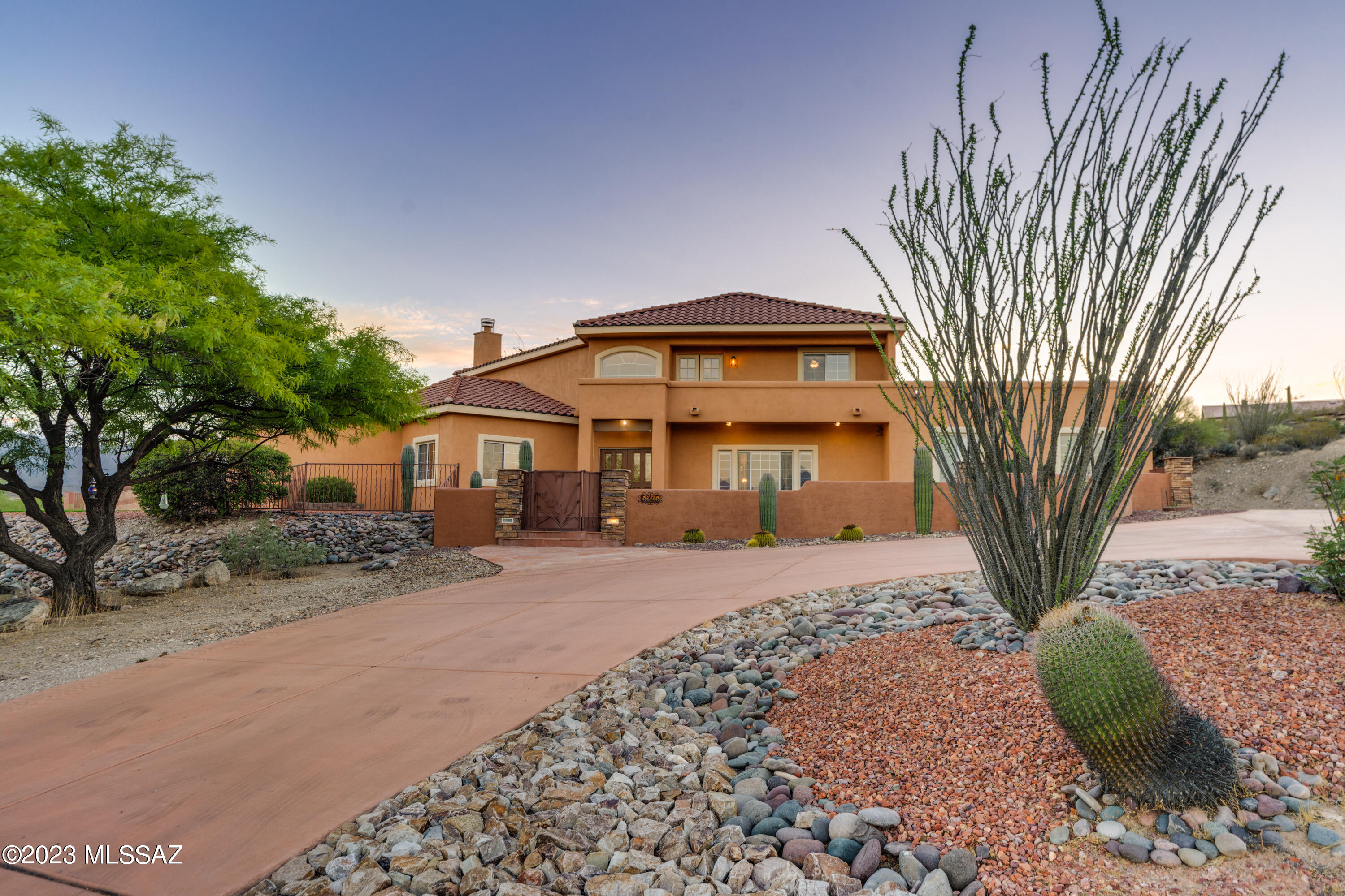Welcome to your dream oasis in Tucson's scenic west side! This remarkable property offers everything you've been searching for and more. Situated on a sprawling 3.3-acre lot, this horse property is a nature lover's paradise, boasting breathtaking mountain, city, sunrise, and sunset views that will leave you in awe every day.Perched on an elevated lot, this custom home is a true masterpiece. With no HOA restrictions, you have the freedom to bring your vision to life and create the perfect sanctuary. Indulge in the blissful Arizona weather by taking a refreshing dip in the sparkling pool or unwinding in the soothing spa. The expansive outdoor living spaces and Ramada provide a shaded retreat where you can entertain guests or simply relax with a good book. Parking is a breeze with the convenient 3-car garage + RV carport, ensuring ample space for your vehicles and storage needs. The property's prime location offers the best of both worlds - just minutes away from both I-10 and downtown, providing easy access to transportation and entertainment options. You'll also find yourself conveniently close to amenities and major employers, making your daily life a breeze. Don't miss this incredible opportunity to own a slice of paradise in Tucson's west side. Embrace the serenity of nature, savor the stunning views, and revel in the freedom of no HOA restrictions. This property is truly a one-of-a-kind gem that promises a lifestyle beyond compare. Act now and make this exceptional property your own! Refrigerator, Washer & Dryer, water softener and all TV's convey. New pool pump & pool heater.