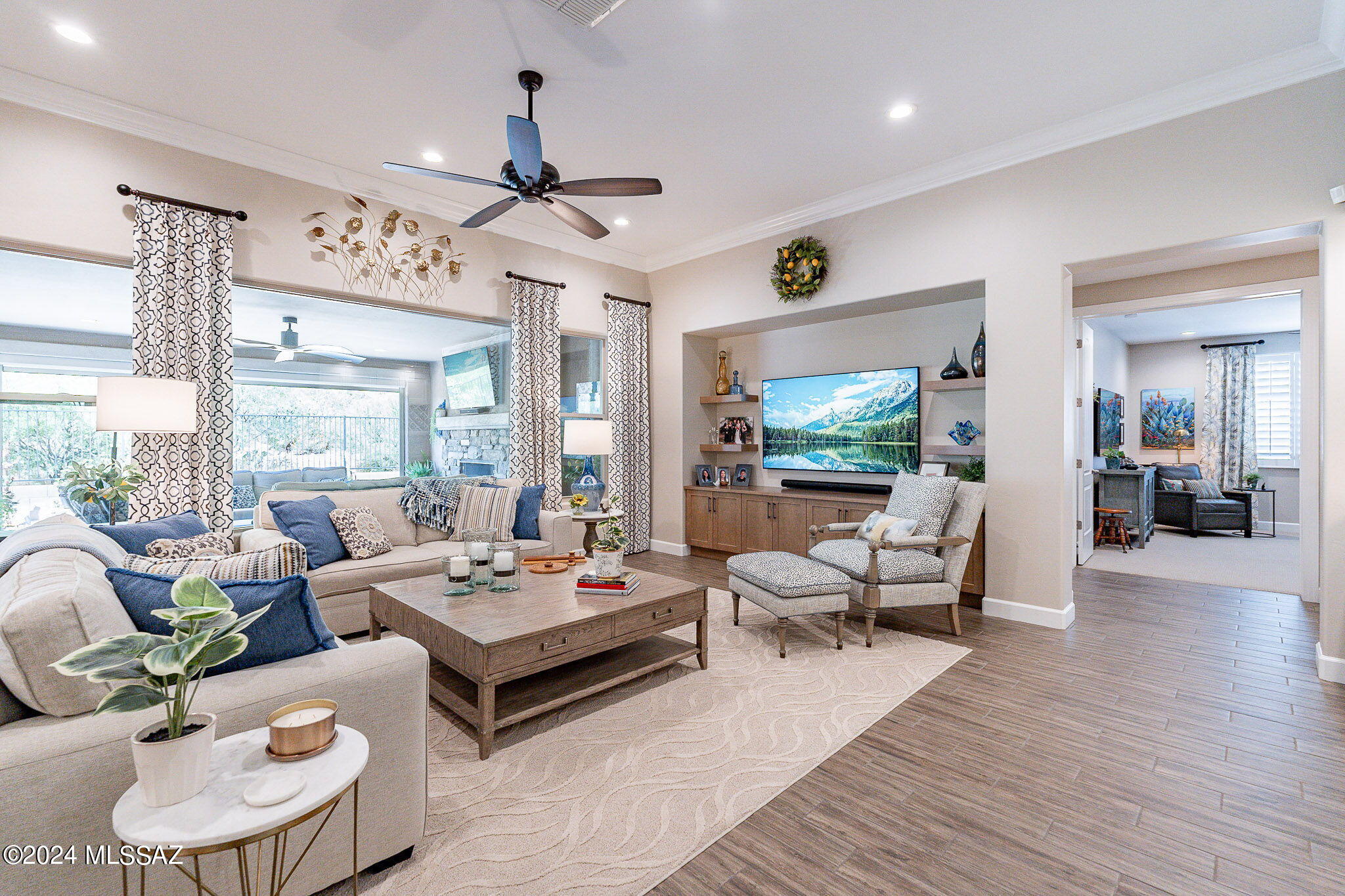 Stunning 2020 expanded PALOMA model with casita and backyard oasis in The Preserve at SaddleBrooke. This one has it all - heated pool, firepit, hot tub, putting green, covered patio w/motorized screens enclosing the cozy outside fireplace room!  This very private, premium lot provides Catalina mountain & desert views. Extensive upgrades: 3 suites plus a den, Wolf/Subzero, quartz counters, wet bar wine fridge, casita w/fridge, travertine patio, shutters, garage storage lowers for easy-access. Primary suite w/tile shower and his/hers closets w/custom organizers. Smart technology features include ring system and app-controlled patio screens, garage doors, fountain and permanently installed holiday lights. Why wait for new construction? Furnishings available w/right offer!