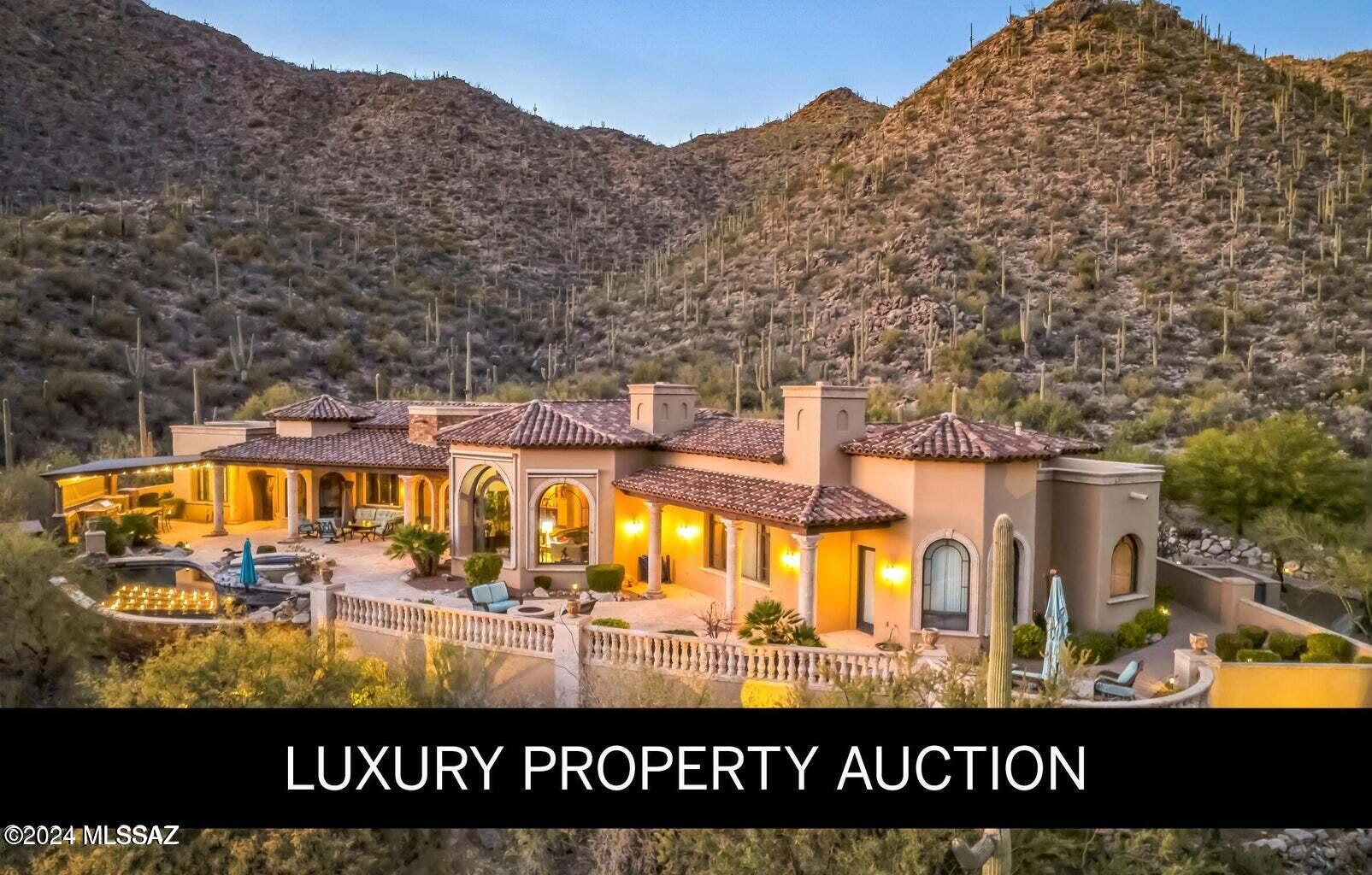 LUXURY PROPERTY AUCTION BIDDING OPEN: Bidding ends January 24. Previously Listed $2.9M. Current High Bid $1.9M. List price will adjust w/bids. An extraordinary Mediterranean masterpiece meticulously crafted by Alan Roberts with interiors by Lori Carroll, this architectural marvel celebrates the dramatic Arizona landscape. Perched on one-and-a-half acres, the estate commands panoramic views of soaring saguaros and monumental mountain ranges. Twelve-foot handcrafted metal doors open to an impressive gathering room defined by arched windows & a dramatic fireplace. European-inspired details emerge through Florentine ceiling techniques, cantera stone elements, & exquisite natural stone flooring. Resort-caliber veranda embraces the entire property, transforming outdoor living into an art form. The fully equipped outdoor kitchen, pizza oven and fire pit area creates an unparalleled entertainment environment. Viking professional appliances, a one thousand bottle wine cellar, and meticulously designed spaces elevate every moment of extraordinary desert luxury, spa style living.
Sold furnished - minus Do-Not-Convey listed in MLS Documents.
Sold "As Is". 
One seller is a licensed agent in the State of Arizona. Please note that one can choose to join no clubs to live in this subdivision or there is also a social membership, a sports club membership for full golf membership available at The Gallery Golf Club. Many varieties of memberships to choose from if desired but no obligation.