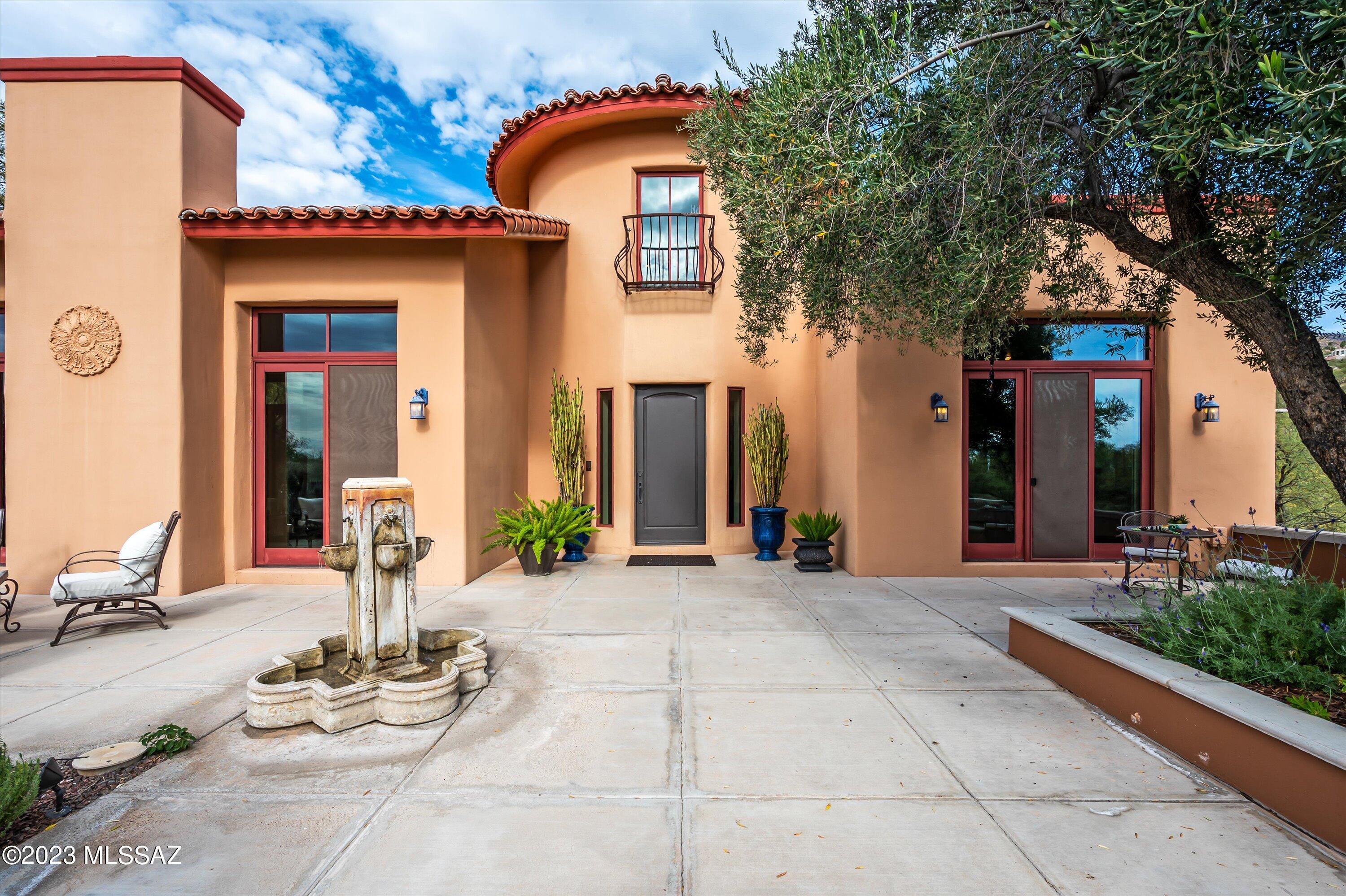 A Tuscan masterpiece in the prestigious Skyline Country Club Estates. This 3-bed, 4-bath haven spans 4196 sq ft, of luxury living with a perfect blend of Mediterranean styling and modern comfort. Elegant design with split suite floorplan ensures privacy, creating a harmonious living space. Luxurious touches like Travertine tile floors, 8' solid wood doors, wood framed windows, and custom wrought iron railings add timeless charm. Mountain or city views from every window.  A gourmet kitchen awaits, providing the ideal space for culinary delights with friends and family. Gas cooktop, double ovens, prep sink, beverage and sub-zero refrigerators, compactor, and even an indoor grill. Whether hosting intimate gatherings or larger celebrations, this home is designed for the art of entertainment.