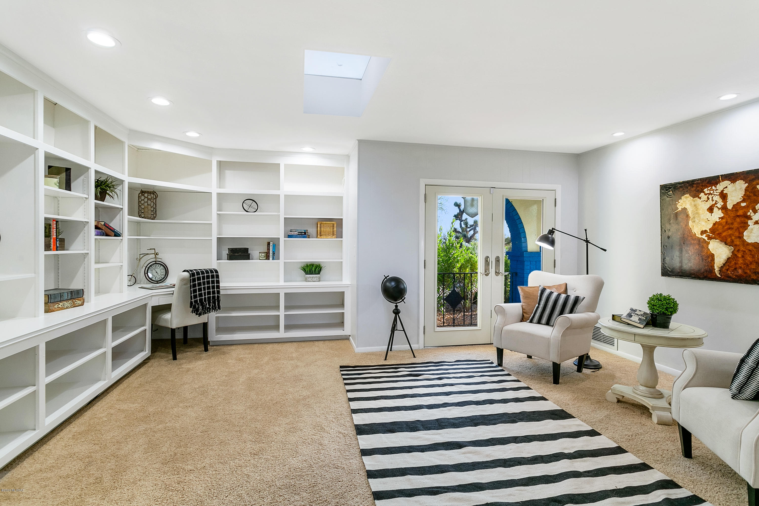 Be DAZZLED!  FULLY PAID FOR SOLAR SYSTEM = $50 a month ELECTRIC bill. Home remodeled & updated in last 2 months! Over an ACRE of land in heart of Catalina Foothills - District 16! 3,600 sq ft home has 4 HUGE BDs, 3 baths, oversized den/office, Great rm, Liv rm, Din rm & Unobstructed views of Catalina Mts from entire back of home & yard. Includes FULL privacy, grassy areas & an Olympic size pool. 4 car garage, tons of walk-in storage, cabinets + a sep Workshop. NEW Interior paint, White Kitchen w/ quartz counters, GAS stove + double ovens. Travertine flooring flooring throughout except bedrooms. New woodwork, termite warranty, roof warranty, new entry & courtyard, Updated electrical lighting  w/ LED white light fixtures, plantation shutters, built in. (List of Upgrades attached) cabinets, new toggle switches - electrical plugs and covers, new hardware (hinges, handles, knobs, front door), landscaping, garage remodeled with new paint and lights, all HVACS serviced and in excellent condition, Carpets cleaned and just waiting for its new owner.  Nothing else like it in the foothills.