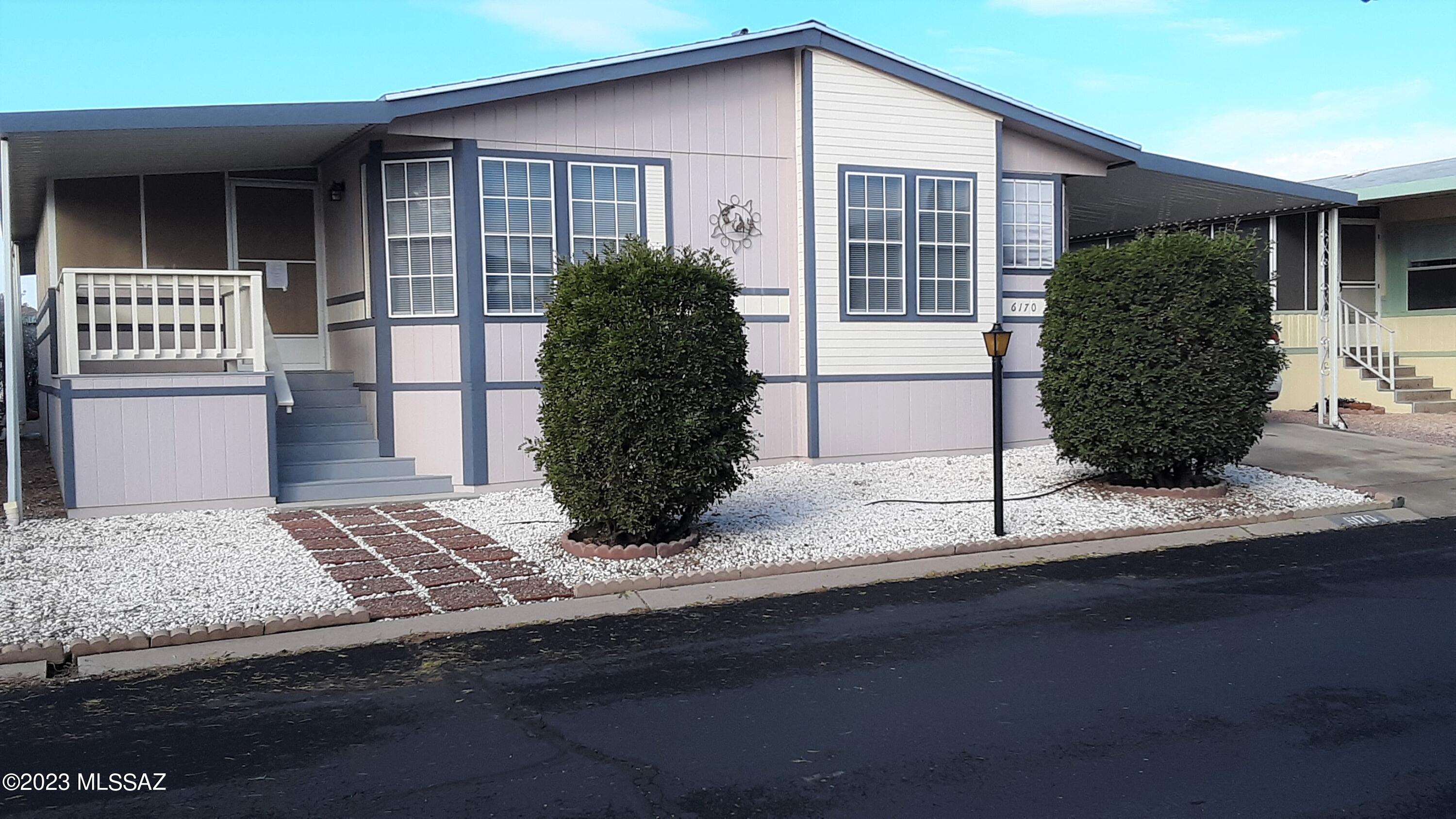 Beautiful and spacious 2+ bdrm home, obviously well cared for, in 55+ community.   Additional room with closet can be used for a study or office.  Ceiling fans, vaulted ceilings. Dual Vanities and walk-in closet in Master.  Relax in screened-in AZ room.  A workshop/shed is in carport, and the rear yard has a bearing orange tree.
Community clubhouse has various amenities and  activities and the area provides restaurants, entertainment, shopping, and more.  
Pool and spa are heated year round.
CALL FIRST.