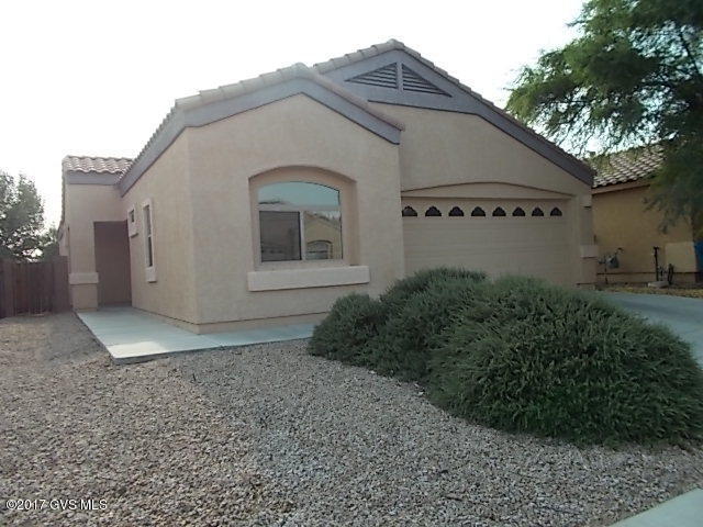 Cooks Kitchen with Island, Corion Counters, pantry and custom cabinets. Garden tub in Master Suite with two sinks and corion counters. Private yard with large covered patio. Priced to sell quickly!