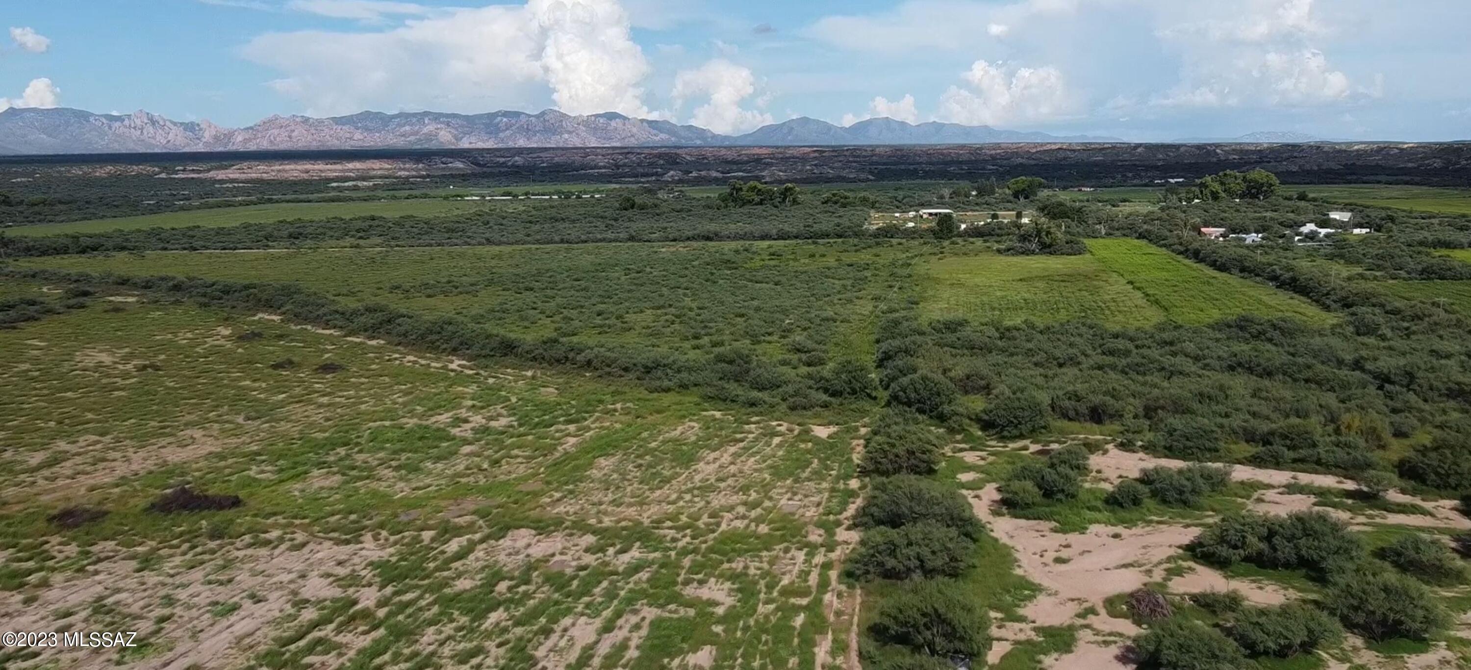 Approx 30 acres farm fields with irrigation wells. Great equestrian riding area or birding in the San Pedro.