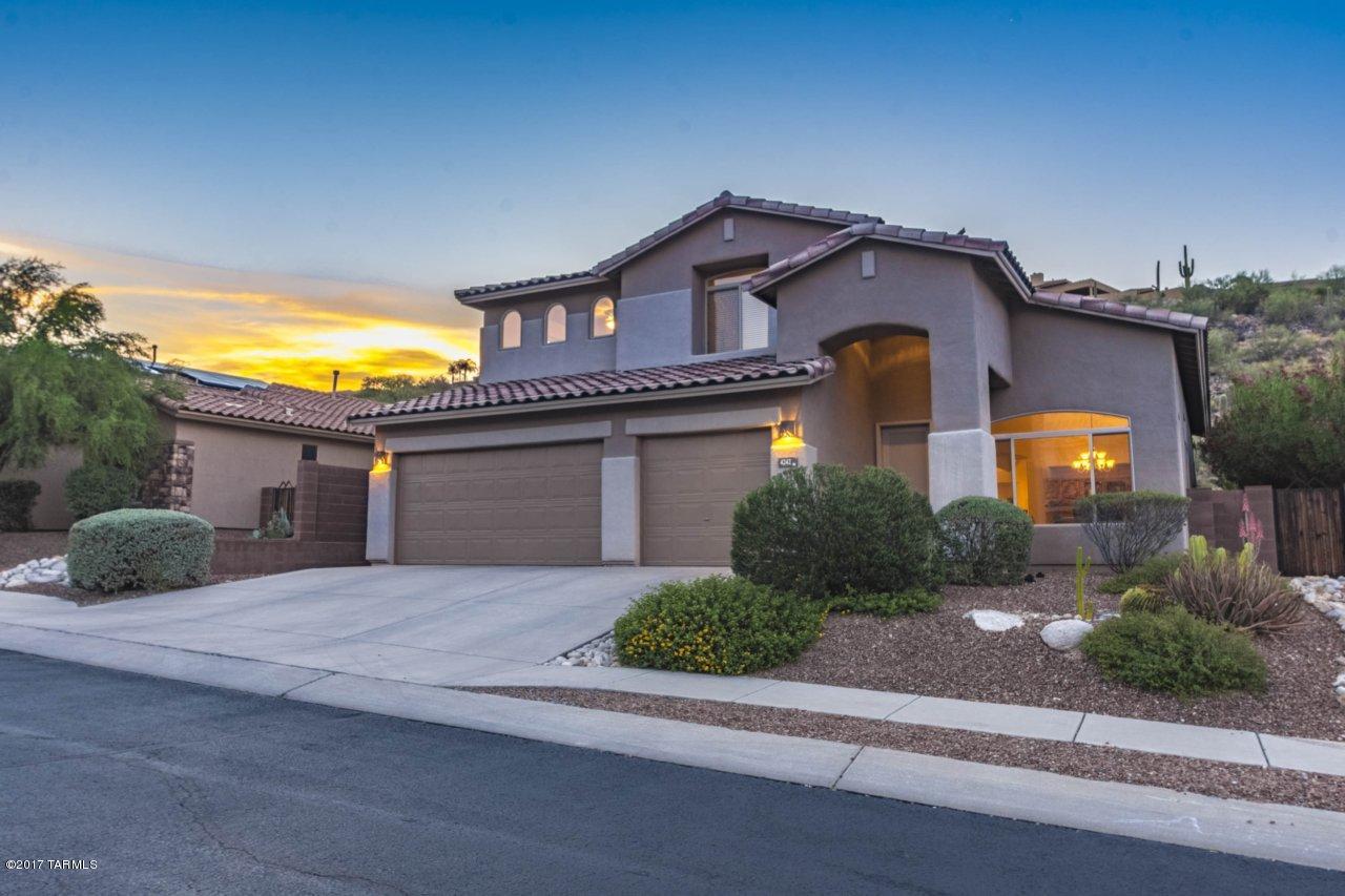 Fabulous 4 BR 3BR 3-car garage with huge upstair loft. Pool is perfect for the size of back yard. Smaller than a traditional pool called a ''spool'' with stone water fall with wrought iron gate for pool barrier. BBQ outdoor cooking area/kitchen. yard in back opens to a gorgeous mountain slope...very private and peaceful. Separate formal living and formal dining room. Large great room off of kitchen with fireplace. Spacious kitchen with center island. Tons of counter space. Huge master bedroom is down stairs. The other 3 are upstairs with a large loft. This home is very well cared for and has been meticulously maintained.
