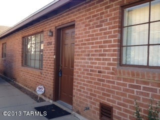Conveniently located, fabulous 2 bedroom, 1 bath townhome just 1 mile from UA.  Features, 1 car carport, and second parking space, appliances including washer/dryer, central AC, small patio