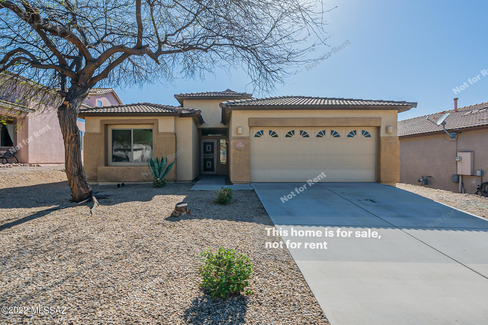 Welcome to this gorgeous neighborhood! Terrific 3 bedroom and 2 bath home with a 2 car garage. Enjoy cooking in this stylish kitchen with stainless appliances and a center island, great for food preparation. Step inside this beautiful interior with tile floors, plenty of natural light, and neutral palette. Primary bathroom features a separate tub and shower and a walk-in closet. Entertain on the covered back patio, perfect for barbecues. Don't wait! Make this beautiful home yours today.