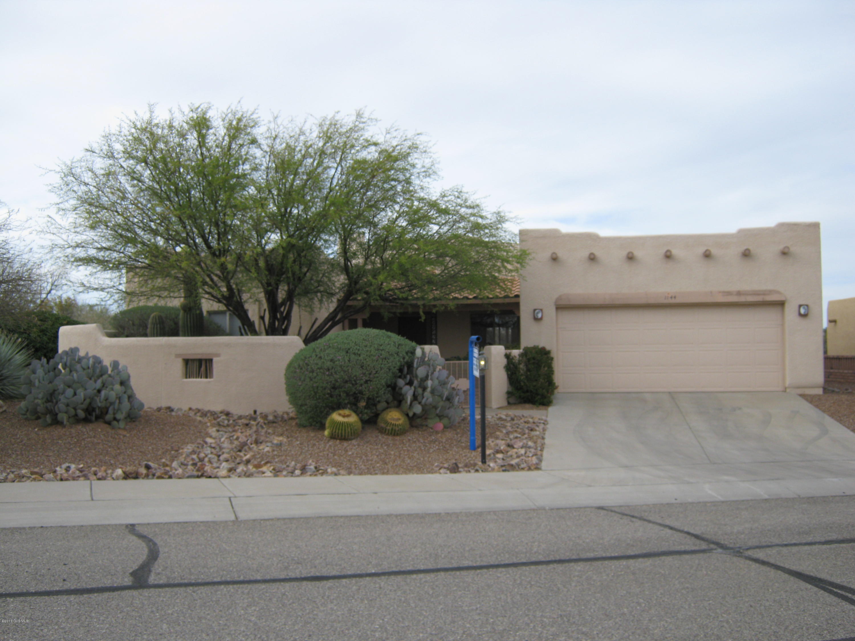Enter this Pierce Custom built 3BR/2BA home through your gated entry. Fabulous quiet area in the back which backs to the desert. Property goes beyond the back wall. Built-In BBQ & Waterfall offer a tranquil setting while enjoying Mtn Views & Wild life. Home is all tile except for bedrooms. Nice walk-in shower in the Master Bath. Wooden Beams accent the living area with your gas log fireplace. You will not be disappointed with this home. SBOS for furniture.