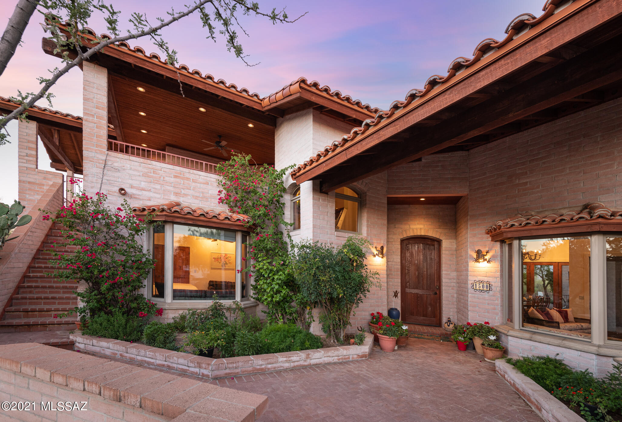Custom Southwest Classic w/privacy & views w/distinctive exterior & interior design capturing warm & aesthetically pleasing elements throughout. 4,921sf 3BR/3BA on 5.87acre nestled between Stone Canyon & La Cholla Airpark. No HOA. Gourmet Kitchen features Viking Range, Sub Zero Refrigerator, beverage cooler, breakfast bar & concrete counters. Great room w/its high vaulted ceiling & exposed wood beams/trusses & large fireplace. Formal Living & Dining Areas. Master suite has fireplace, private bath, walk-in closets & patio access. Upstairs family room, bedroom & bathroom w/private deck/patio. Tiled roof, Concrete floors, several covered patios & 3 car garage+carport. Imagine Horseback riding, mountain biking & hiking right from your front door. Secluded yet close to all Oro Valley amenities.
