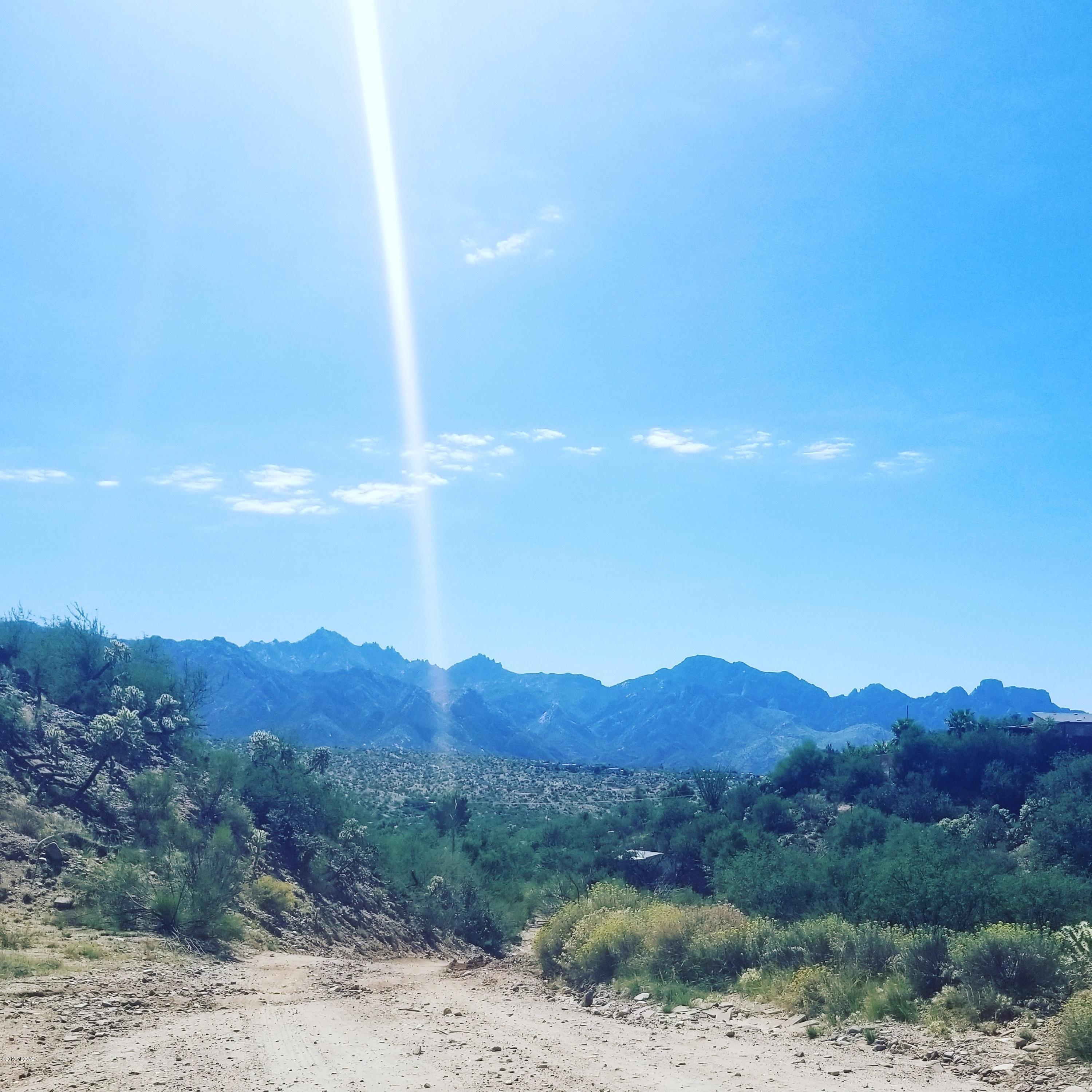 Nice parcel of land to build  your dream home with Catalina mountain Views! Close to shopping  and amenities. This lot is priced to sell fast, come have a look today and vision peaceful rural living at its finest!
