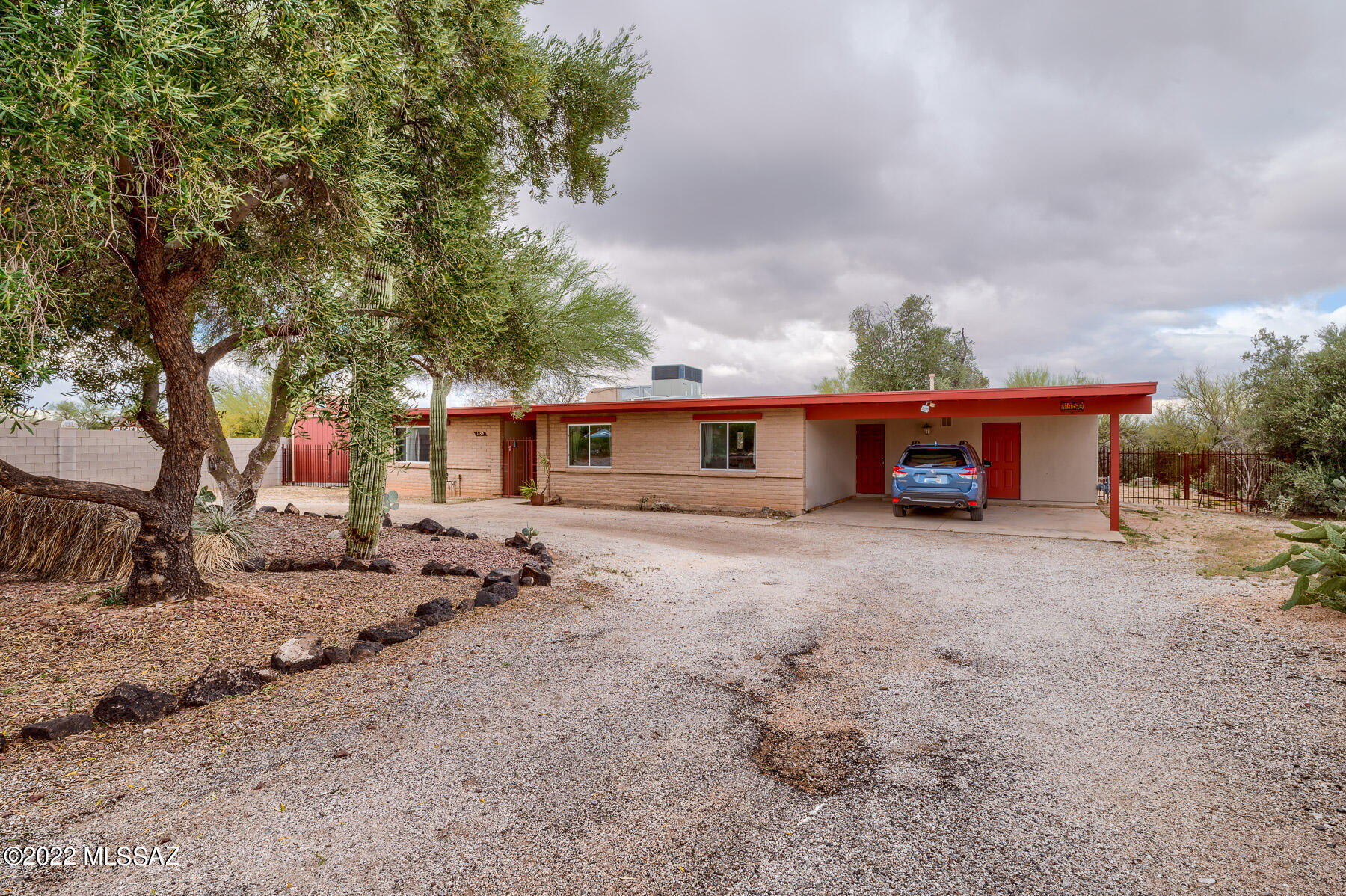 Beautiful East side home in a great location! Updated kitchen with granite countertops, newer a/c, new luxury vinyl in bedrooms, new water heater,  and stainless appliances. Dual-pane windows. Nice, mature trees & low care landscaping in front, and huge backyard. No HOA!!
