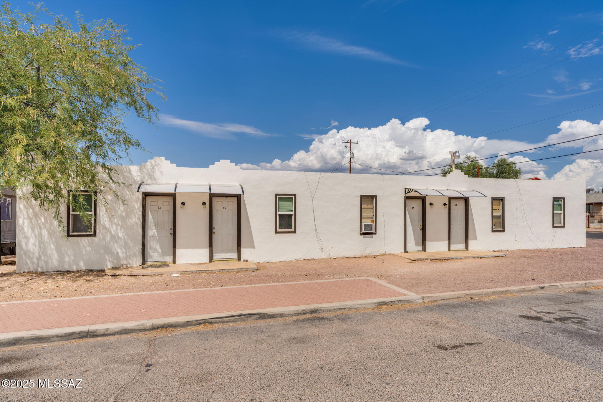 Affordable Living in the Heart of South Tucson! Discover a rare investment opportunity in a vibrant, well-connected community. This multi-unit property offers a mix of housing options, perfect for generating steady rental income:
5 spacious apartments, 1 cozy studio unit
& 8 well-maintained mobile homes. Highlights & Location Benefits:
•	Prime South Tucson location near shopping, dining, schools, and public transportation
•	Quick access to I-10 and downtown Tucson
•	Established neighborhood with a strong sense of community
•	On-site parking and green space

Ideal for investors or owner-operators looking for a property with multiple income streams in a high-demand rental market. Increased Income Potential