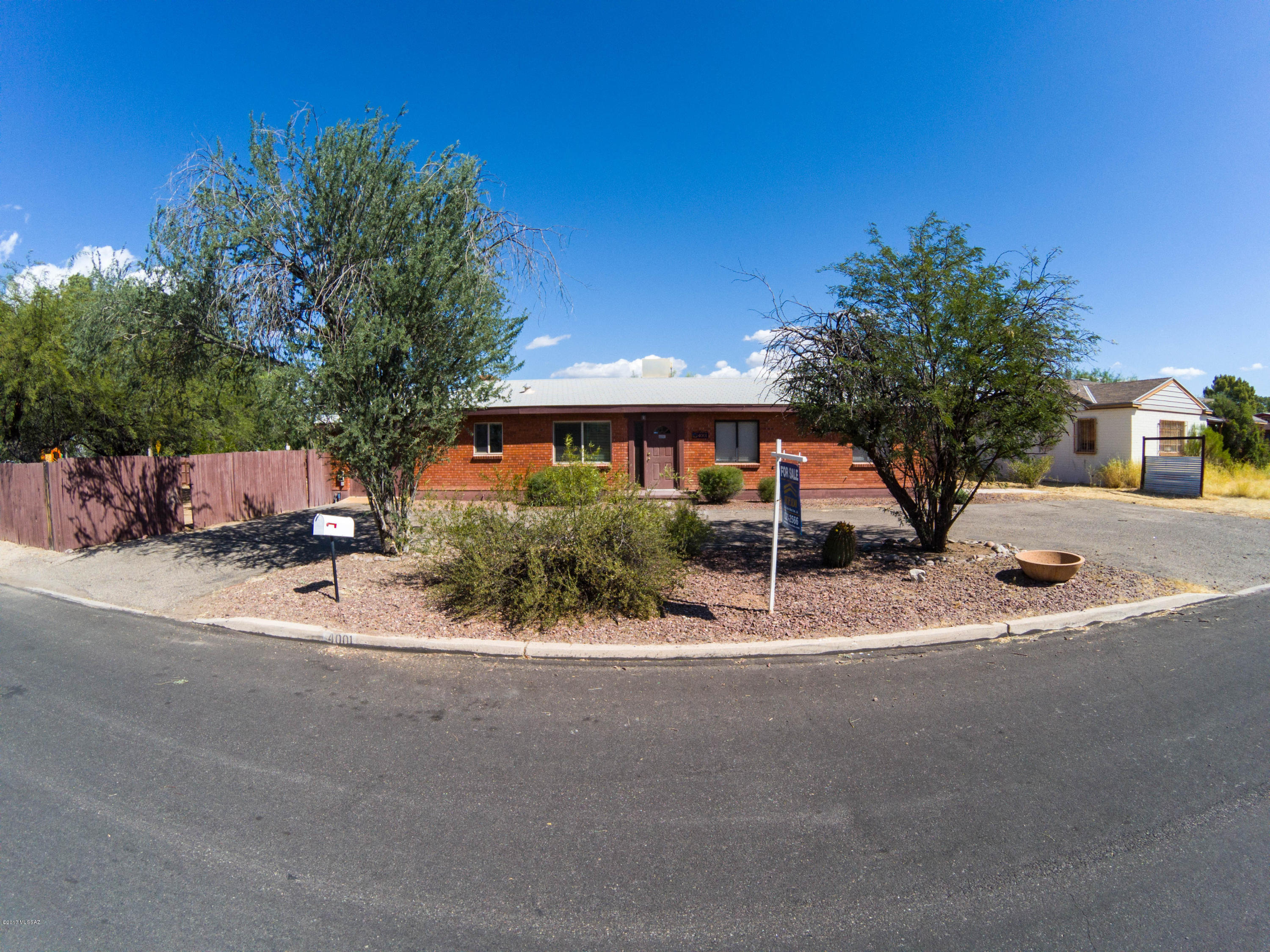 Location, Location! Gorgeous newly remodeled home on a huge corner lot, right next to neighborhood park! New Kitchen Cabinets & Granite Counter Tops. New Stainless Steel Stove, Dishwasher, and Hood Vent. New Granite Counter, Tile Surround, and Vanity in guest bathroom. Beamed Vaulted Ceilings in Living Room with Fireplace. Floor to Ceiling Glass Windows looking out to backyard. Huge Covered Patio. New Faux Wood Blinds Throughout. Den can be used as a 4th BR or an entertainment room. Hurry this home will not last, it is a RARE FIND!