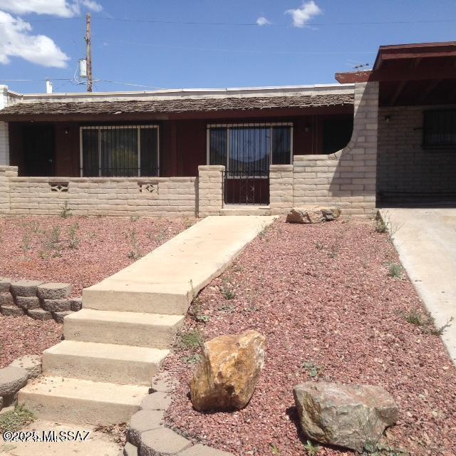Great Investors home! Close to bus line, ceramic floors.  Security bars on front windows. Large storage off carport. need TLC AS IS condition