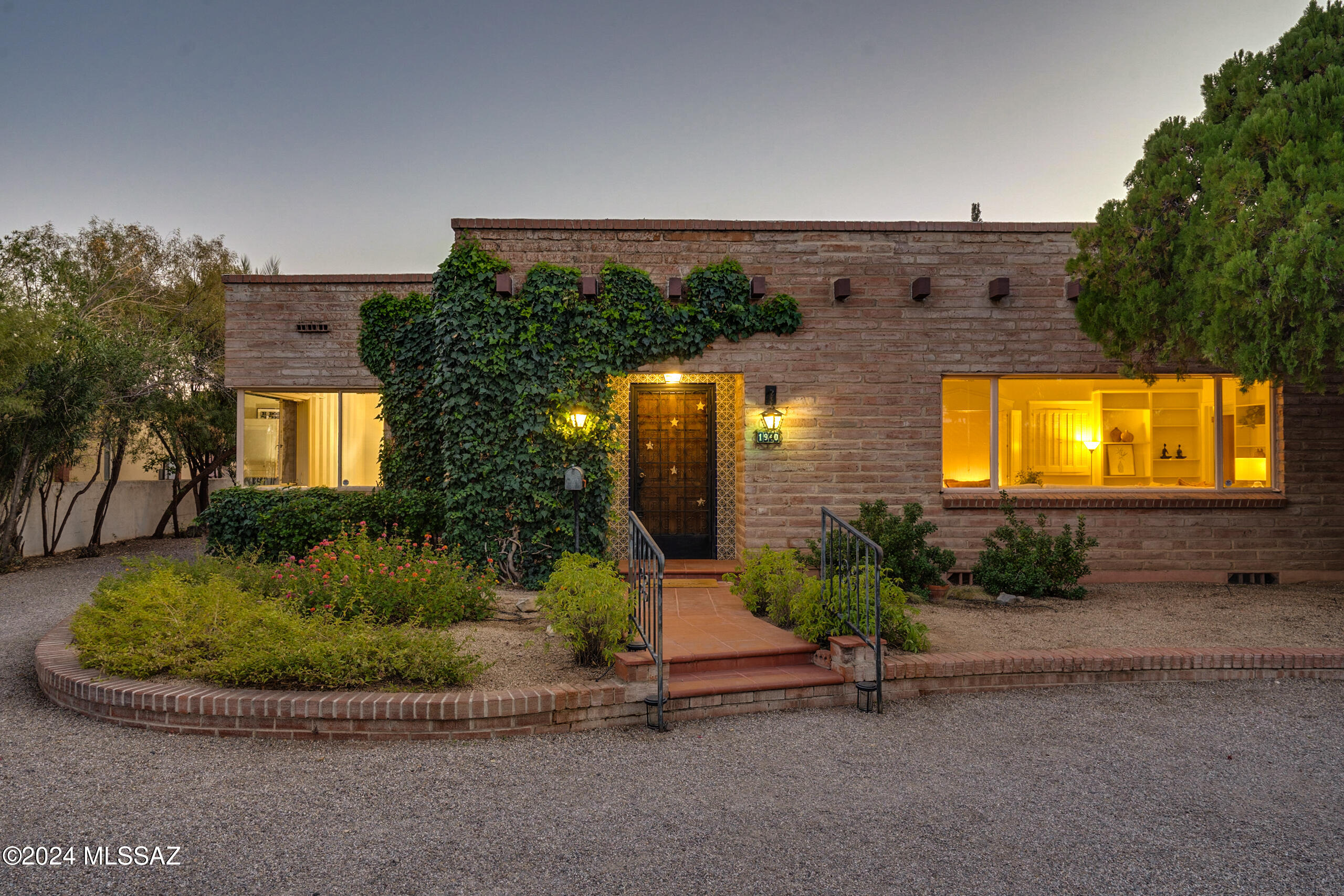 This home combines historic character with modern amenities, all in the heart of Tucson's cultural & medical district. Situated a few doors down from the Arizona Inn & directly across from Banner University Medical Center, this 1952 historic home offers timeless charm in a highly sought-after location. The main house features 3 beds/2.5 baths, showcasing a blend of mid-century design & practicality. The separate guesthouse includes 1 bed/1 bath, providing an excellent space for visitors or rental opportunities.
A basement is used as a mechanical room, enhancing the functionality of the home. Additional parking in the alley ensures convenience for guests staying in the guesthouse. With a spacious lot, the property is perfect for outdoor entertaining Entertaining takes center stage on the expansive back courtyard, perfect for gatherings or serene relaxation. Across the courtyard, you'll find convenient access to the guesthouse, complete with a hidden gema private garage for the tenant. This home offers a secluded oasis brimming with charm and awaiting your personal finishing touches. The possibilities are endless in this unique property with boundless potential.