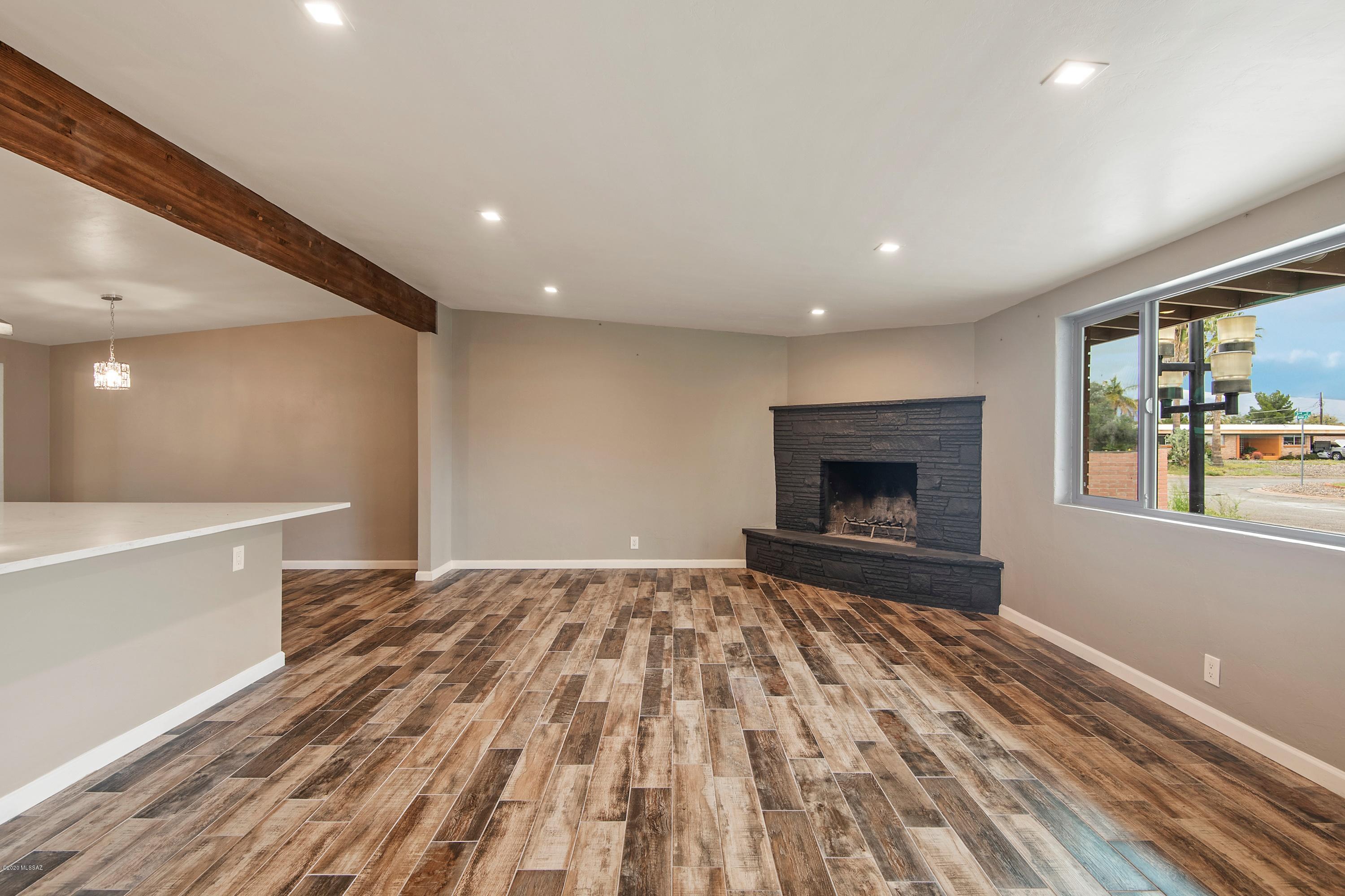 Owner/Agent. Welcome home. Enjoy this newly remodeled open floor plan main kitchen and living area. Entertain and show off the beautifully remodeled kitchen with an eleven person wrap around kitchen peninsula. As you walk throughout the newly custom porcelain plank flooring, you will see newly remodeled bedrooms and bathrooms, newly coated retextured walls and new coat of paint. All new windows for added R-value, new roof, new plumbing and electrical fixtures and new stainless steel appliances. This house offers a separate mother in law suite with a kitchen. A true sized one bedroom and 1 bathroom little house. All new updates on this one! Owner/Agent.