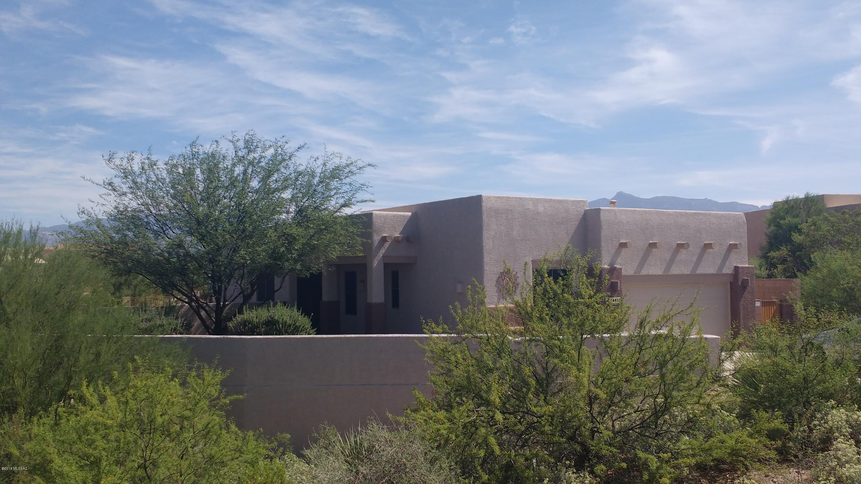 Wonderful 3BR+Den home on a large private lot with nice mountain views in every direction. Pride of ownership really shows in this beautiful santa fe style home with desert nature all around you. Kitchen has maple cabinets, granite countertops and large breakfast bar. 10 foot ceilings. Large ceramic tile throughout except bedrooms. Good size master bedroom with patio access. Den could easily be a 4th bedroom with a closet alcove already in place. Beautiful Arizona Sunsets can be enjoyed from side patio. New Safeway shopping center is very convenient as well as the award winning Vail Schools which are also a close distance. EZ access to I-10, DMAFB, Raytheon, Revitalized Downtown Tucson, Sonoita, Saguaro National Park. 1 hour to Ft Huachuca(Sierra Vista) & Wilcox.