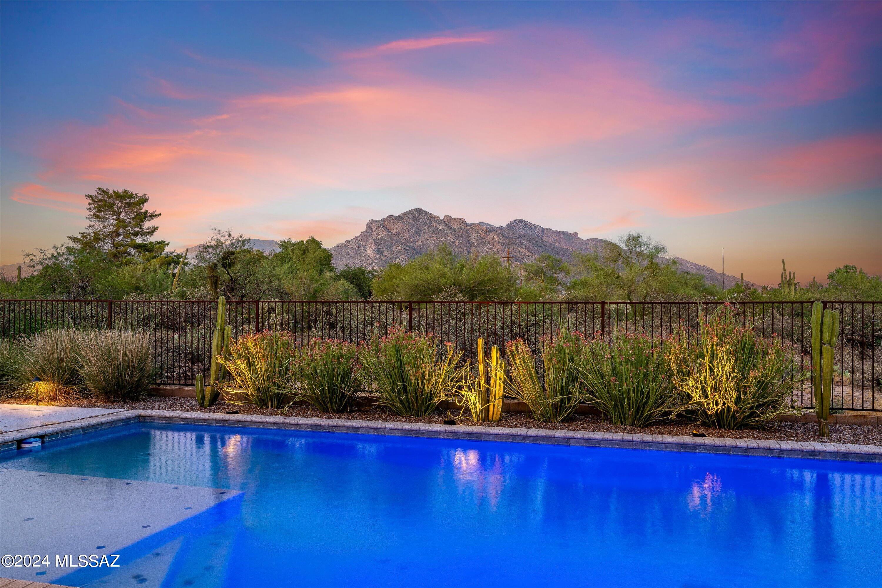 Explore the epitome of modern living in this expansive 3173 s/f 5BD/4BA single story home, featuring a unique Next Gen suite. Enjoy sweeping views from every angle of the open floor plan, which seamlessly integrates a gourmet kitchen with top-of-the-line SS appliances and a spacious living area. Step outside to your private oasis, complete with outdoor kitchen, gas firepit, TV, and a sparkling pool perfect for entertaining or relaxing after a busy day. This home offers unparalleled comfort and flexibility and is ideal for multigenerational living or hosting guests in style!   If you expect nothing but the best, YOUR SEARCH ENDS HERE!