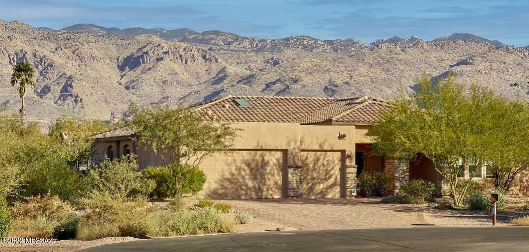 Beautifully upgraded AF Sterling home in the Tanque Verde Valley. Popular split floor plan with great room, three beds, den, plus flex room. Large yard offers private pool and spa with solar water heater, custom built BBQ, ramada, shed, rain harvest barrel, and lush low maintenance plantings. Generous side yard with 14' double gate allows for many possibilities. Conveniently located near 49er country club, Emily Gray Jr High, Barnyard restaurant, walking trails, and more.