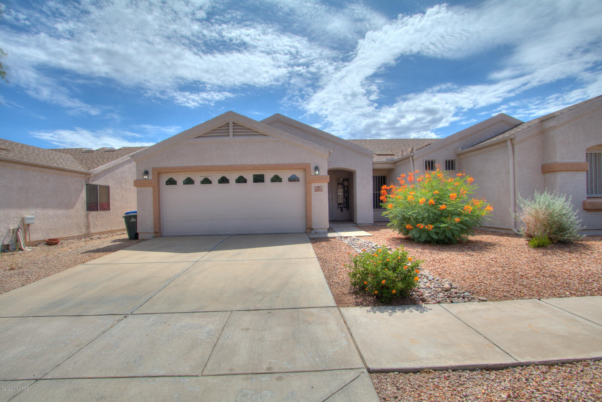 Stunning and spacious!  Walk into this 3 bedroom, 2 bath (plus a den!) nestled in a quiet community and you're going to want to stay!
The large kitchen has gorgeous granite counter tops, a chef's sink and cabinet and pantry space many only dream of.  New flooring, paint, tile, bathroom vanities and fixtures...all done in elegant designer colors. Split floor plan with a sumptuous master suite!  2 car garage, covered patio, laundry room, den.  Close to Davis Monthan, shopping, medical
