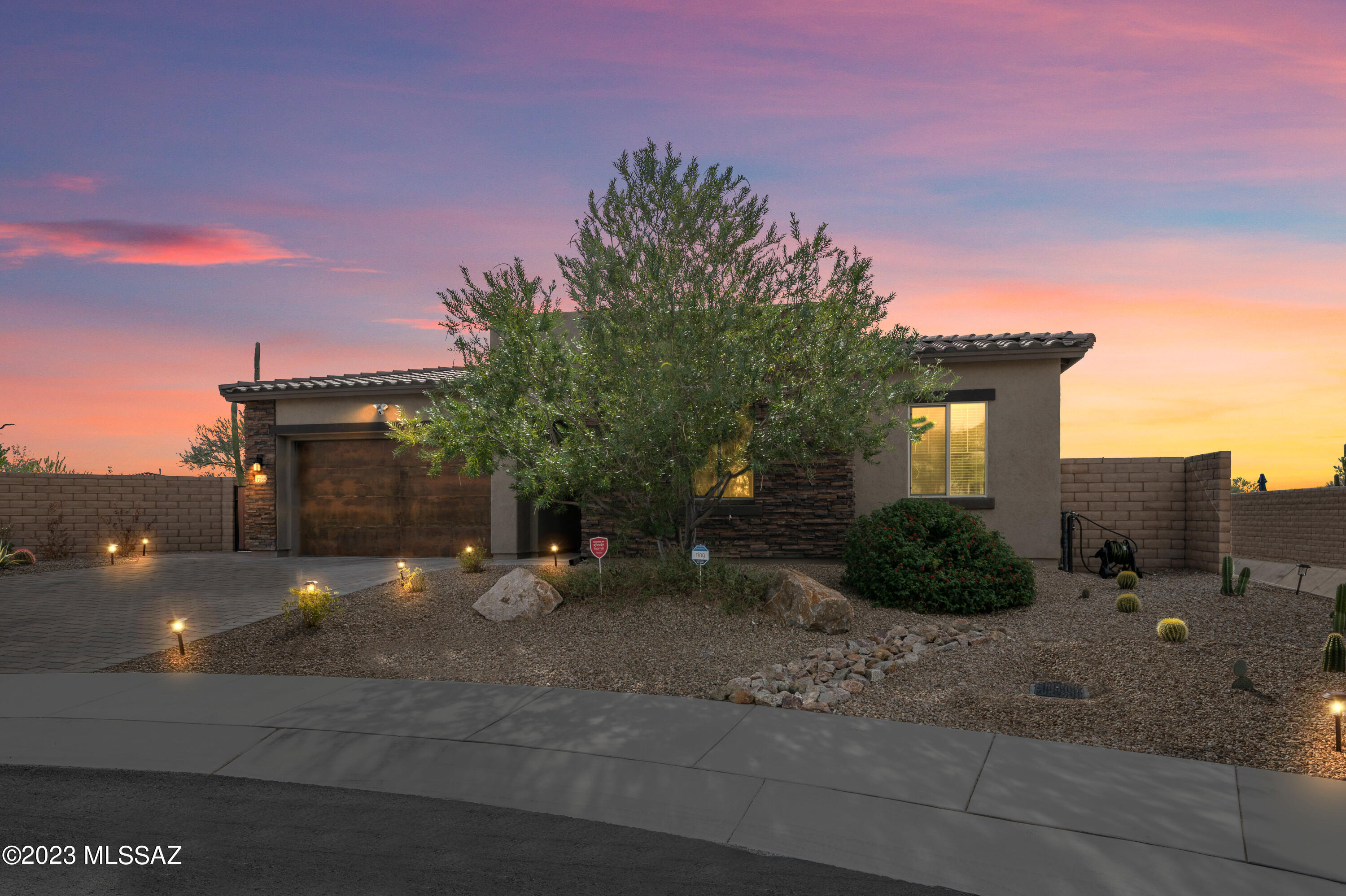 Beautiful Views -  MOUTAIN AND GOLF COURSE VIEWS!! 
Welcome to this stunning home nestled in the prestigious Boulder Pass Dove Mountain Community.  This 3B/2.5BA turnkey home offers and open floorplan with eat in kitchen. The extra flex space can be used for your formal dining space or grand piano! It is currently being enjoyed as a wine tasting area. Luxurious features include California Closets in each bedroom and garage! With ceiling fans throughout the home, SS appliances, and highly upgraded master shower.  Best of all it includes a private outdoor sanctuary that calls to you upon entering the home. 
Prepare your preferred meal in the spacious covered patio area at your outdoor chef's paradise island kitchen. Featuring granite counter