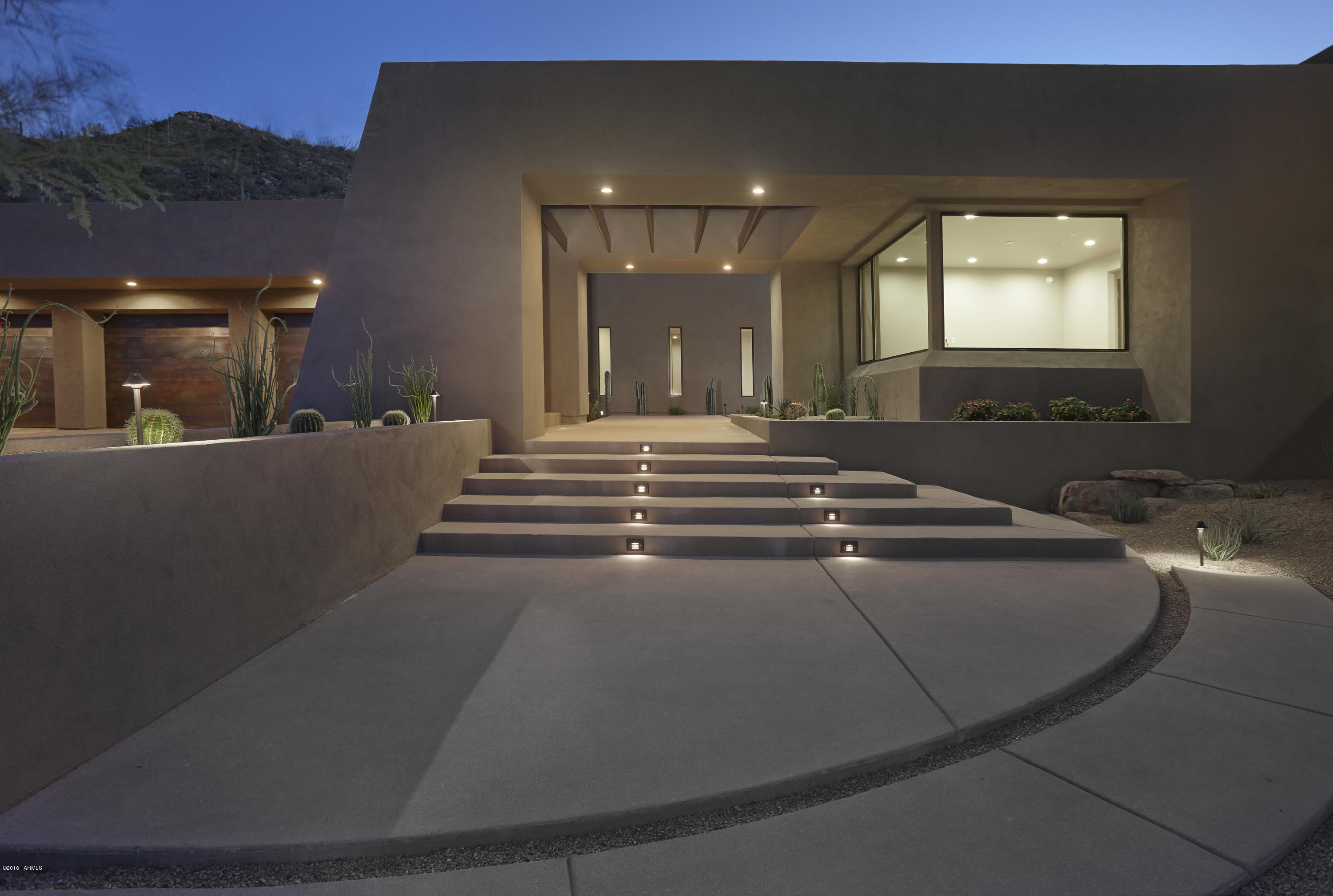 Gorgeous brand new home in the stunning neighborhood of Canyon Pass.  Perched among the Tortolita Mountains on a light filled 2 acre lot, this desert gem features immaculate landscape with mature trees and cacti, private courtyard entry, Huge pool & spa and arguably one of the best outdoor patio spaces in Southern Arizona.  Entertain beneath soaring great room ceilings; unleash your inner Julia Child in the gourmet indoor and outdoor kitchens featuring appliances by Sub-Zero & Wolf.  Indulge yourself in the master suite with its own exercise room, spa-like bath and custom closet.  Your guests will love the large guest suites with walk-in closets, amazing views and fabulous bathrooms.  The large den is the perfect workplace as long as you don't let the endless mountain views distract you.