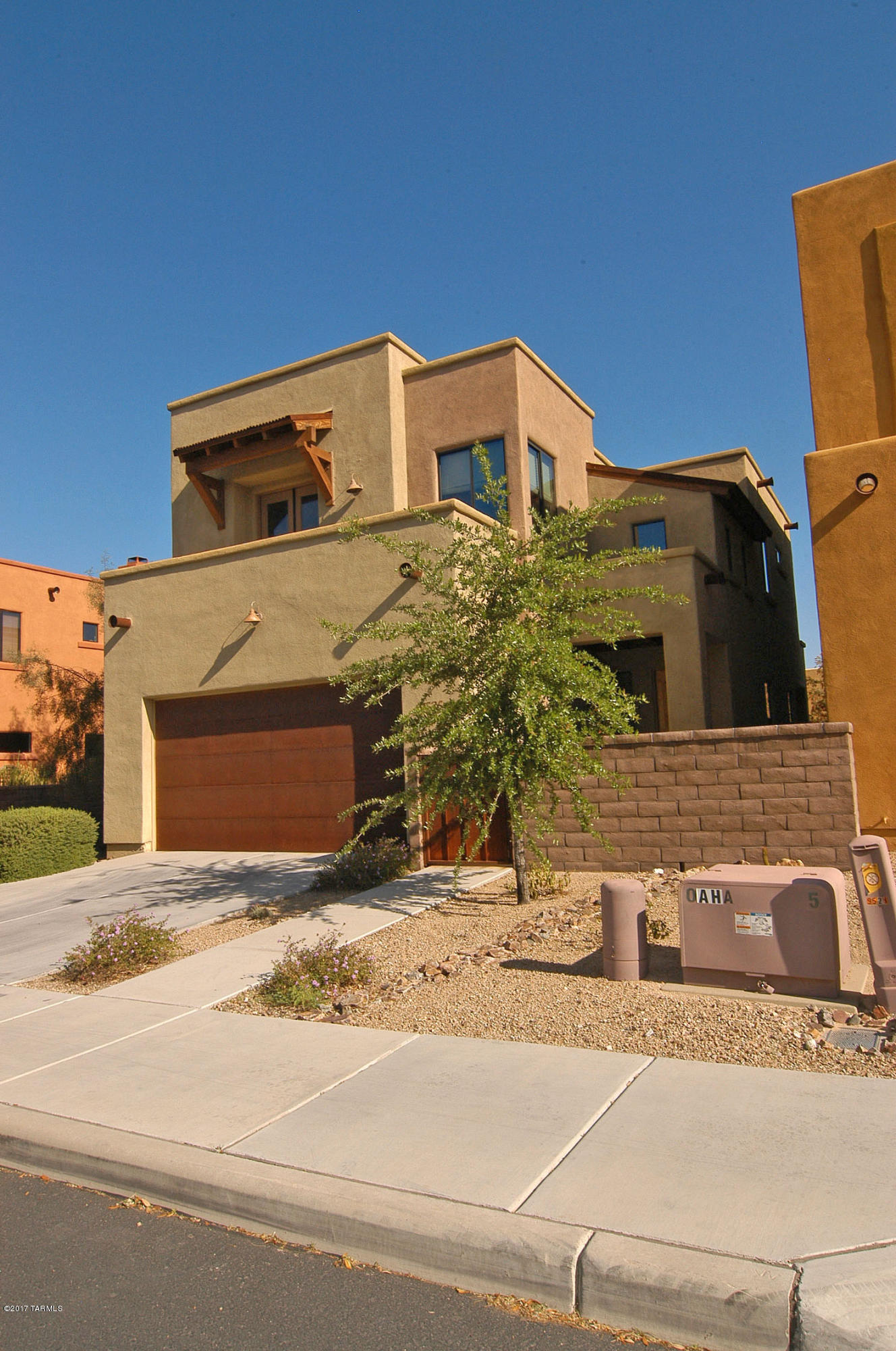 !Immaculate,shows like a model! ! 3 Br, 2 &I/2 baths,open floor plan,vaulted ceilings,great room,neutral colors,plush carpeting and covered patio.Beautiful views of Catalina  mountains from all north facing windows. Stainless steel appliances, +washer,dryer,walk-in pantry,lots of storage, alarm. Upstairs,view 0f mountains is magnificent from master-suite . a loft area for office, Balcony,fans.This is a premium corner lot, north/south orientation, next to commom area. Community pool, in a lovely , newer east-side subdivision.
REDUCEDFOR QUICK SALE!