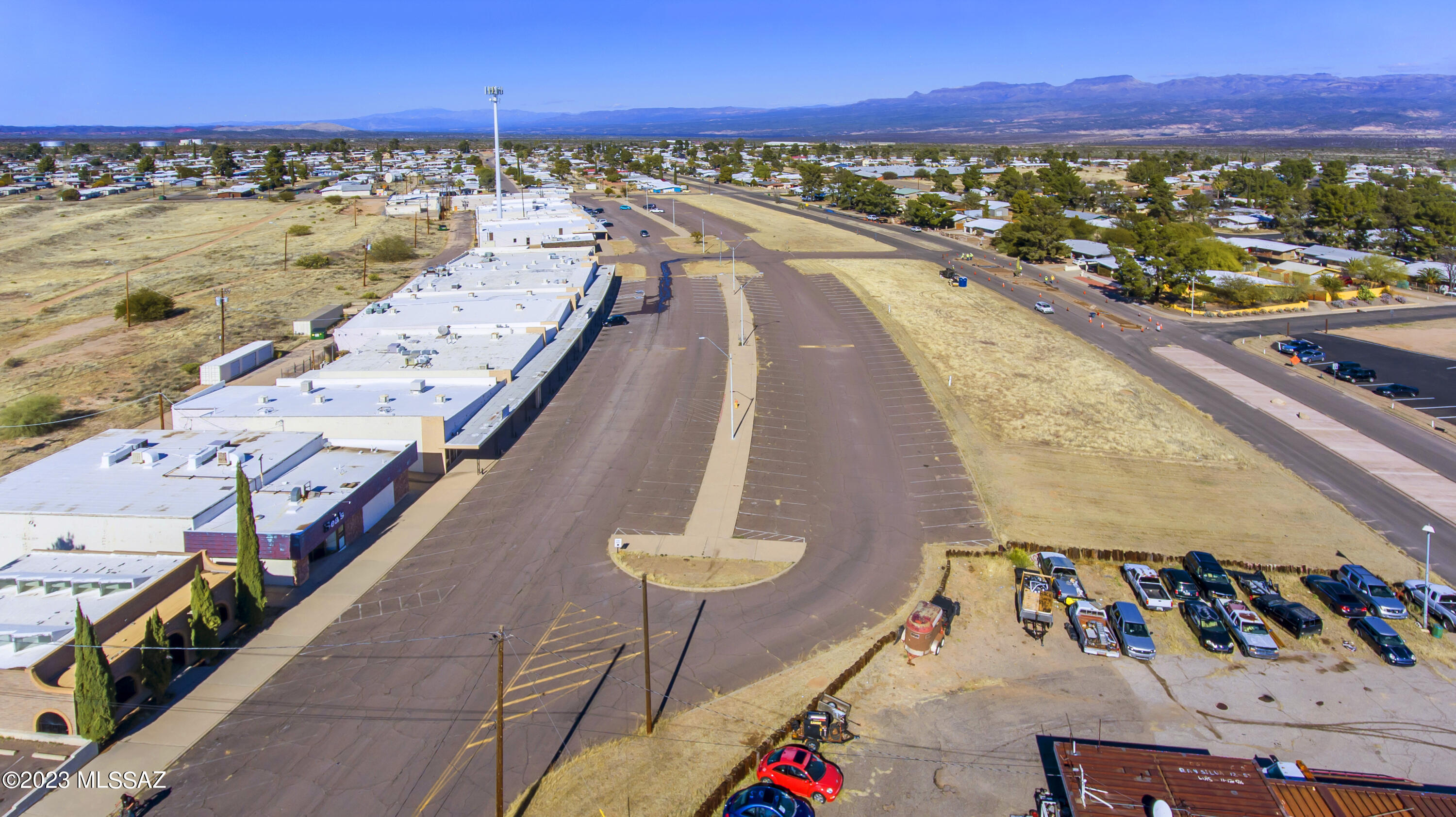 Approximately 68000 ft shopping center. 21 units, 15 units are rented, There is so much potential. One unit was a bank and still has the safe. Units range from 400 sqft to 14,860 sqft.  There are 317 parking spaces that are 20x10. All roads and parking spaces are asphalted. There are about 8,000 to 10,000 people in San Manuel and the adjoining towns and areas that shop here in San Manuel.