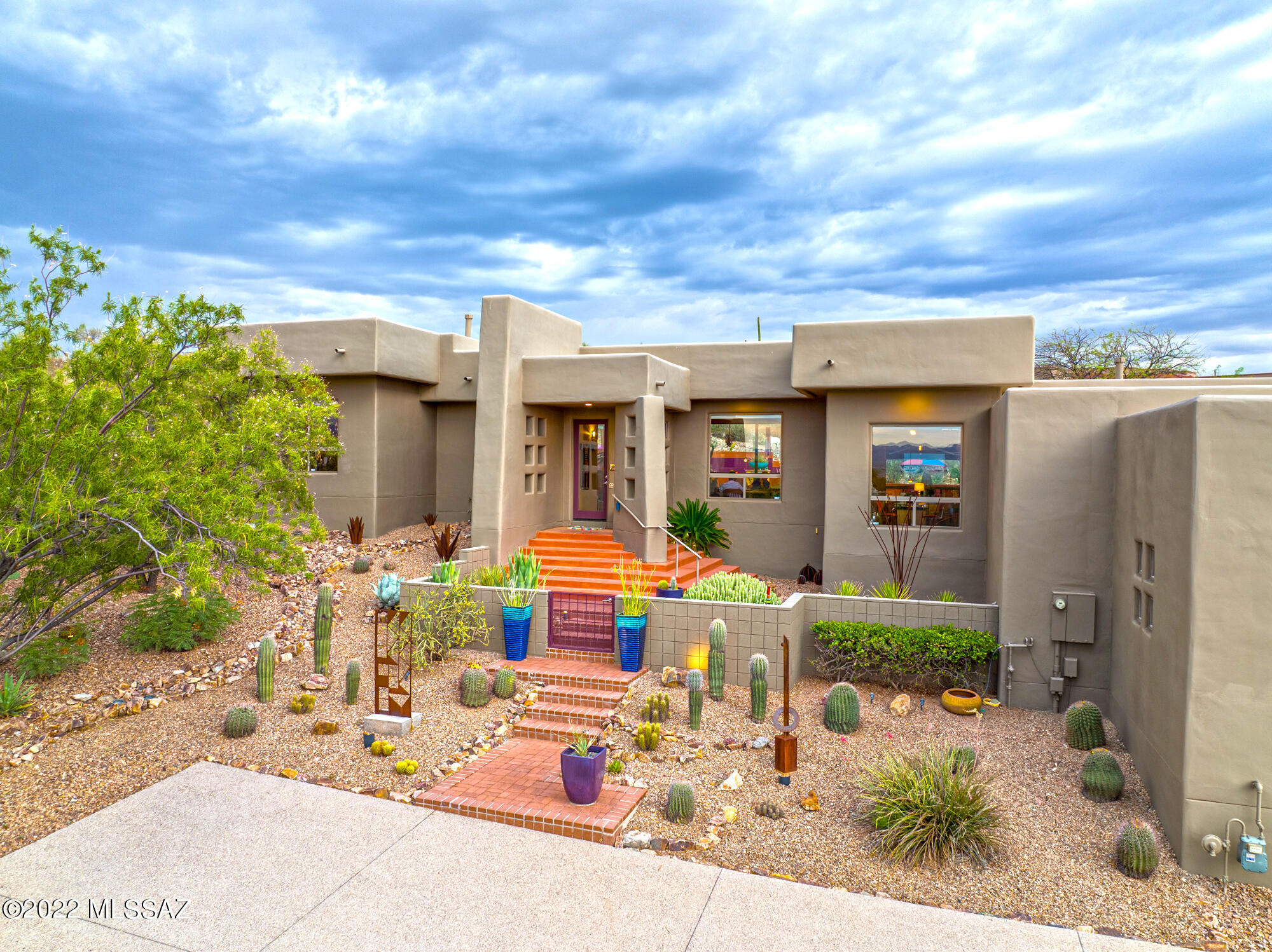 You will never want to leave your private desert oasis! Situated on 3.3 acres in the beautiful gated community of the Tucson Mountain Reserve, this property offers comfort and serenity. Step inside to 2,615 square feet of living space that has high ceilings and abundant windows throughout to capture beautiful mountain views and natural desert. Home features a split floor plan with 4 bedrooms, 3 baths, and a 3 car garage. Stained concrete leaves no carpets throughout. The spacious Chef's kitchen has a large island, lots of cabinets to store items, comes with brand new Frigidaire refrigerator, GE stove top, oven, and microwave will make it a perfect area to cook and entertain guests. All appliances were purchased in May/June 2022. Primary bedroom's bathroom has been elegantly updated with a beautiful soak in tub with great views, walk in shower and walk in closet. The backyard is spacious with the pebble tec pool as the focal point making it perfect for parties, cookouts, or stargazing. The 3 car garage has ample storage with shelving and room for a workshop even when your vehicles are parked inside. In the evening, enjoy beautiful sunsets to the west and at night, you can see city's lights. Its location is close to shopping, restaurants, and very easy access to I-10. The pride of ownership shows! Step outside the community gate, and it welcomes you with many desert trails to take for hiking or biking . A true hidden gem with much to offer! Come see today!!