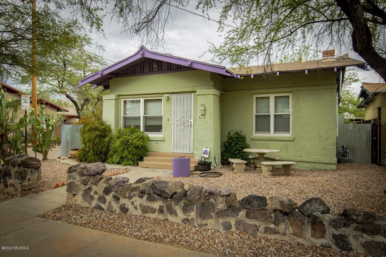 ARMORY PARK- Enjoy living in Tucson's first Historic District. This classis bungalow is on the Historic Registry and is on a street with many architecturally unique homes. Historic front wall made from rocks from Sentinel Peak. Two spacious bedrooms, vintage hardwood floors, claw foot tub, newer windows and AC installed 5 yrs ago. Kitchen features a cozy nook and new countertop. Back yard space with porch, mature trees and built-in charcoal BBQ. Professionally cleaned and ready to move in.
