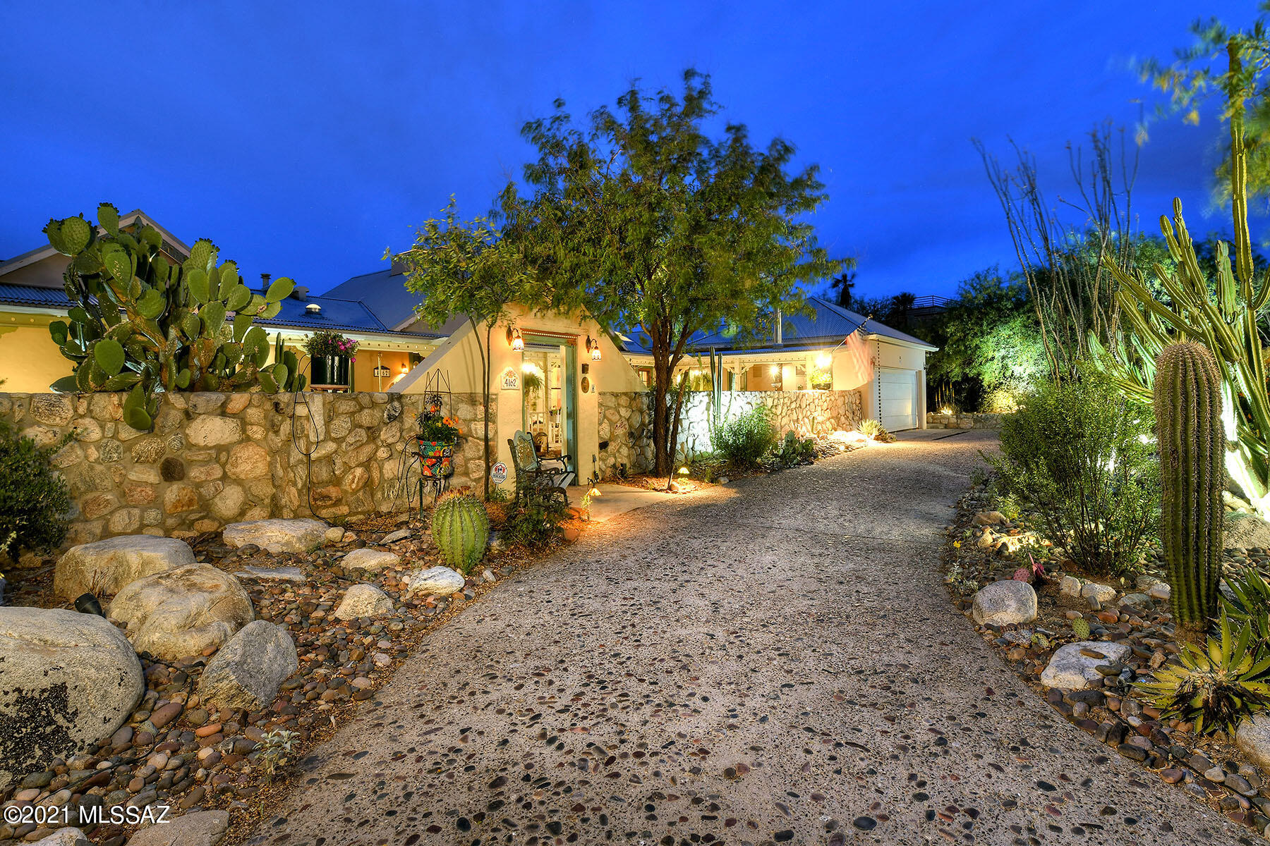 Welcome to this 4 bedroom/3 bathroom, 2967SF home located in the desirable neighborhood of Coronado Foothills Estates on a .89 acre view lot.  Extended covered patios, refreshing pool & spa and numerous outdoor verandas envelope the residence with each having been thoughtfully positioned to provide seamless indoor-outdoor entertaining, al fresco dining & perfect for immersing oneself into the tranquil surroundings showcased by the Santa Catalina Mountains & captivating twinkling Tucson city lights. Ideal floor plan with inviting family room flows perfectly into the open concept kitchen. Huge master suite offers large walk-in closet, jetted tub, dual vanities & walk-in shower. Northwest bedroom with private ensuite has separate entrance & could be used as guest quarters. This single story home has tile & stained concrete floors, no interior steps, ceiling fans, multiple fireplaces & is full of charm & whimsy. Close to Finger Rock Trailhead, La Encantada Shopping Center & fine restaurants.  District 16 Schools.