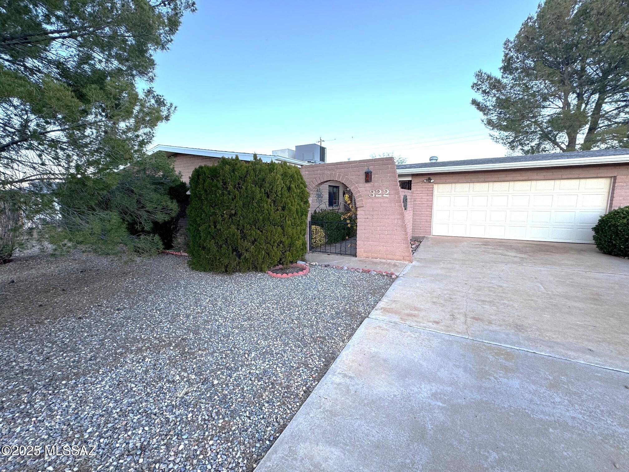 Very nice, well-maintained 2 bedroom, 2 bath home offering comfort, character, and beautiful surroundings. The home was completely replumbed in 2023 and features a newer heating and cooling gas pack installed in 2019, along with a newer roof replaced in 2023. Dual pane windows with low emissive windows in the front. A large enclosed Arizona room provides flexible living space and could easily be used as a game room or third bedroom. The home includes an attached garage, a nicely maintained yard with beautiful mature shade trees. Enjoy the spectacular Arizona sunsets behind the famous Dragoon Mountains.  This home has been lovingly cared for and is move-in ready.