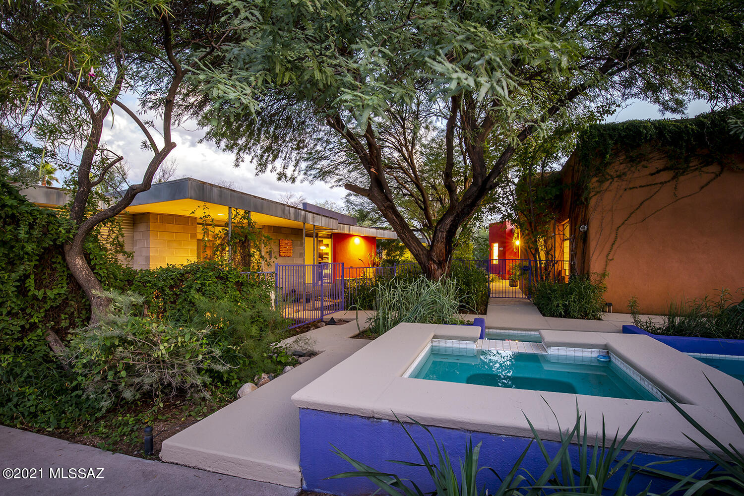 3 timelessly designed contemporary masonry homes on 1 midtown property in a brilliant, botanical garden setting...an office, guest house, multi-gen living or income property...it's YOUR choice!  This modern compound includes The Pavilion Home (1,597 sf), Garden Home (1,097 sf) & Companion Home (1,243 sf). Three, 2 bdrm homes + lap pool, spa, 2 car garage + 3 car carport + 1/2 court bkbl court. Offer perfectly versatile living options designed for & by Frank Mascia-CDG Architects. With privacy & serenity in mind, these homes masterfully use space, angles, air, light, color & windows. Blended indoor/outdoor spaces & patios, concrete floors throughout (radiant in-floor heating in Pavilion Home), solid masonry construction & gorgeous landscape with Catalina Mtn views.